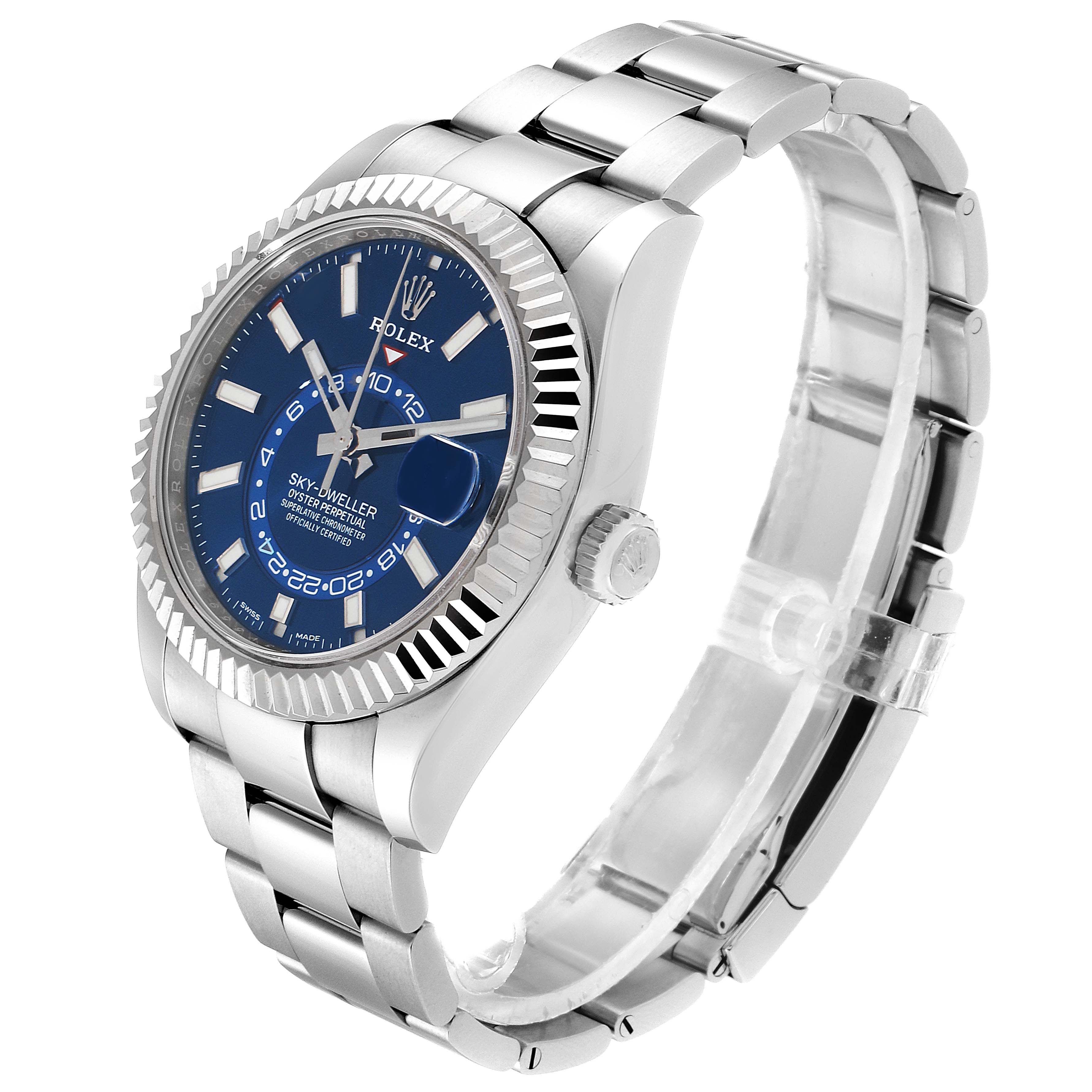 The image shows a Rolex Sky-Dweller 326934 Men's Stainless Steel Blue Dial 326934 Men's Stainless Steel Blue Dial watch at a three-quarter angle, focusing on the face, bezel, and bracelet.