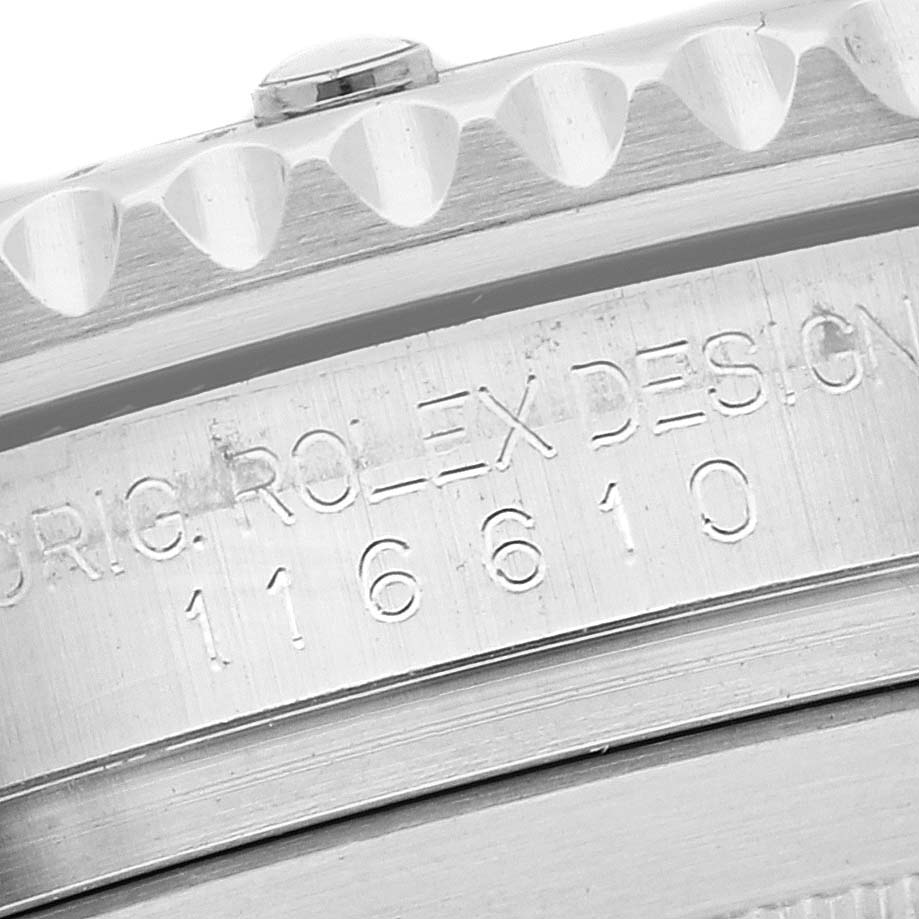 The image shows a close-up angle of the bezel, case, and engraved model number of a Rolex Submariner 116610 Men
s Stainless Steel Black Dial 116610 Men
s Stainless Steel Black Dial.