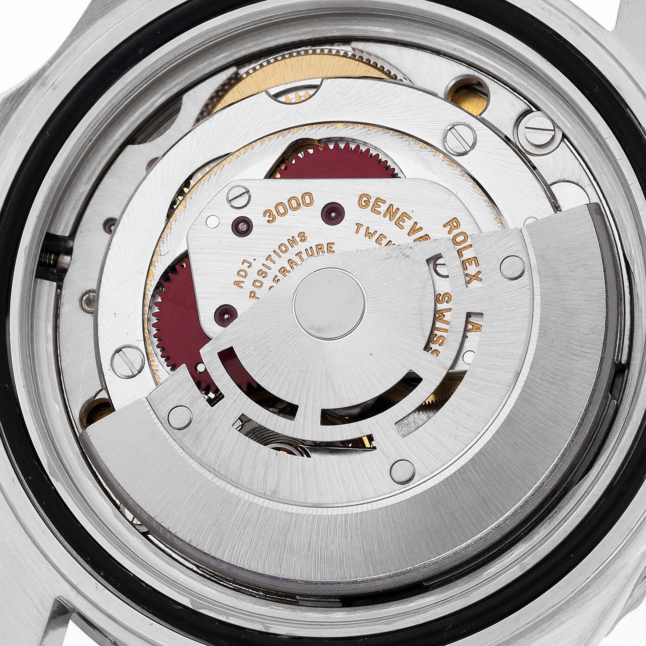 The image shows the open case back view of a Rolex Submariner 14060 Men
s Stainless Steel Black Dial 14060 Men
s Stainless Steel Black Dial, highlighting its intricate movement and rotor.