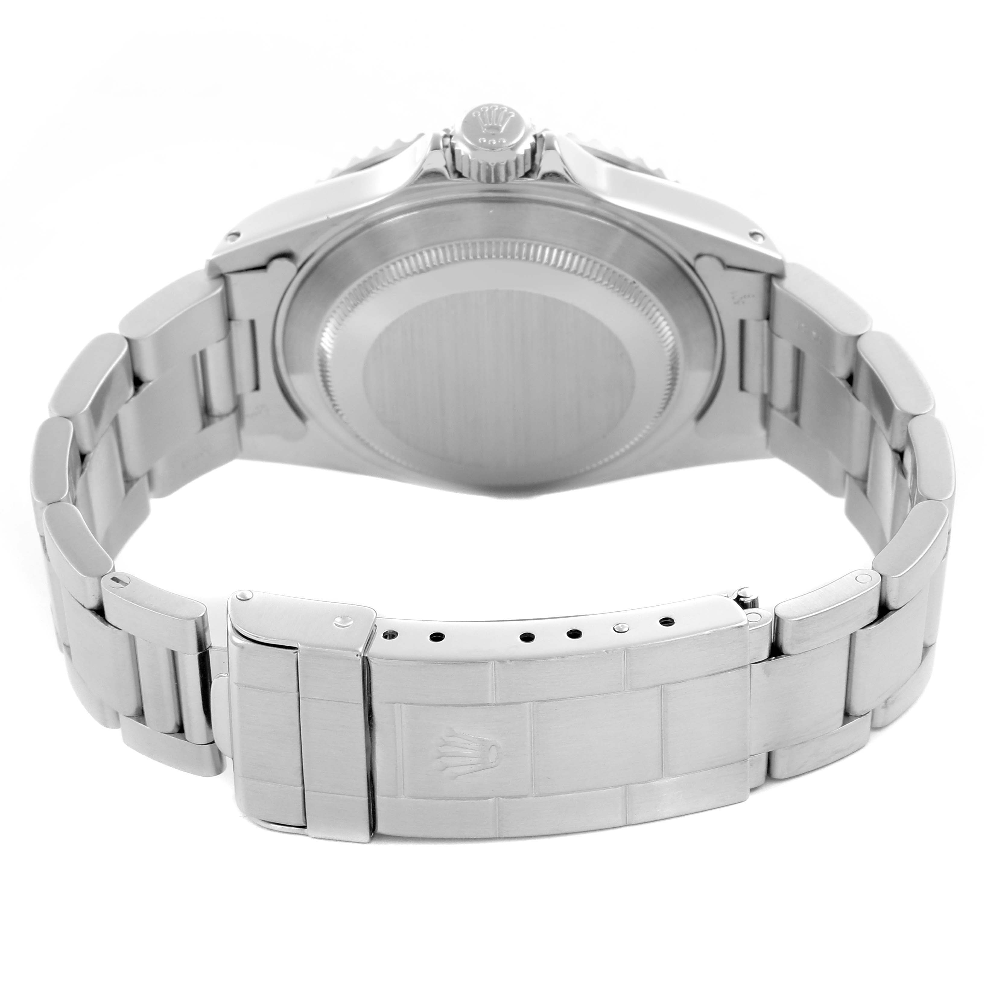 The Rolex Submariner 14060 Men
s Stainless Steel Black Dial 14060 Men
s Stainless Steel Black Dial is shown from the back, highlighting the case, bracelet, and clasp.