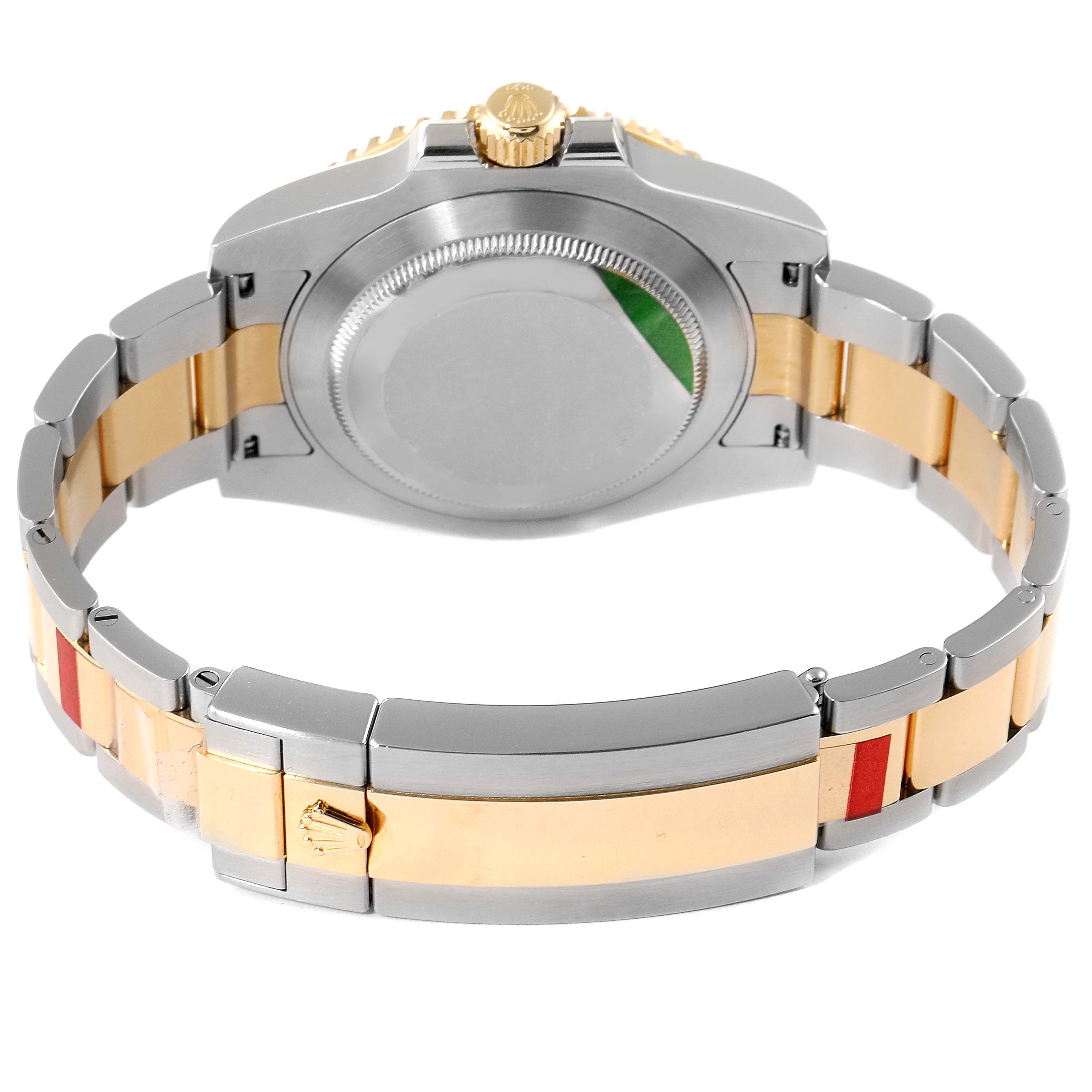 The image shows the back case and bracelet of the Rolex Submariner 116613 Men's Steel and Gold (two tone) Blue Dial 116613 Men's Steel and Gold (two tone) Blue Dial watch, featuring a two-tone metal design.