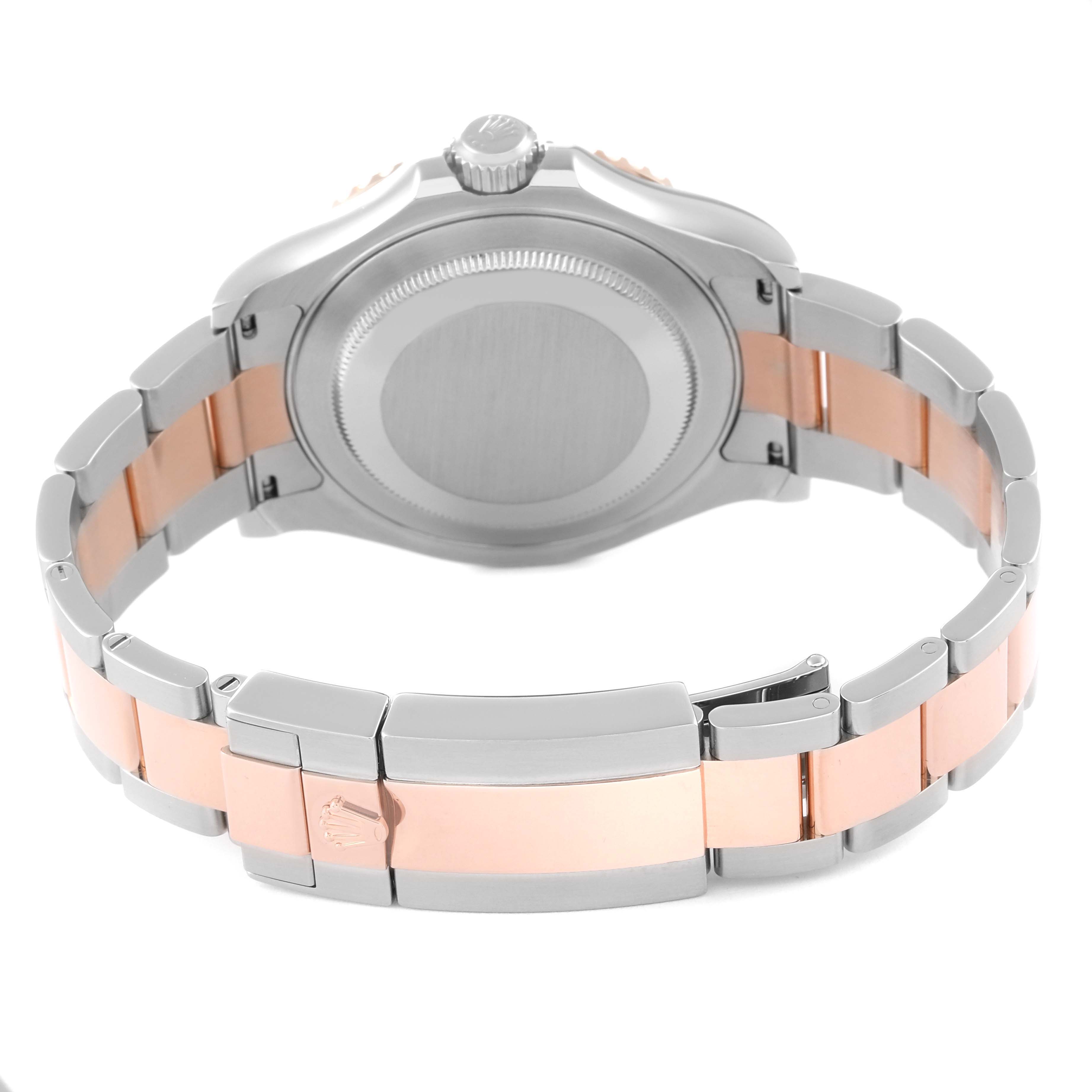 This image shows the back of a Rolex Yacht-Master 116621 Men's Steel and Gold (two tone) Brown Dial 116621 Men's Steel and Gold (two tone) Brown Dial watch, focusing on the case back, crown, and two-tone bracelet.