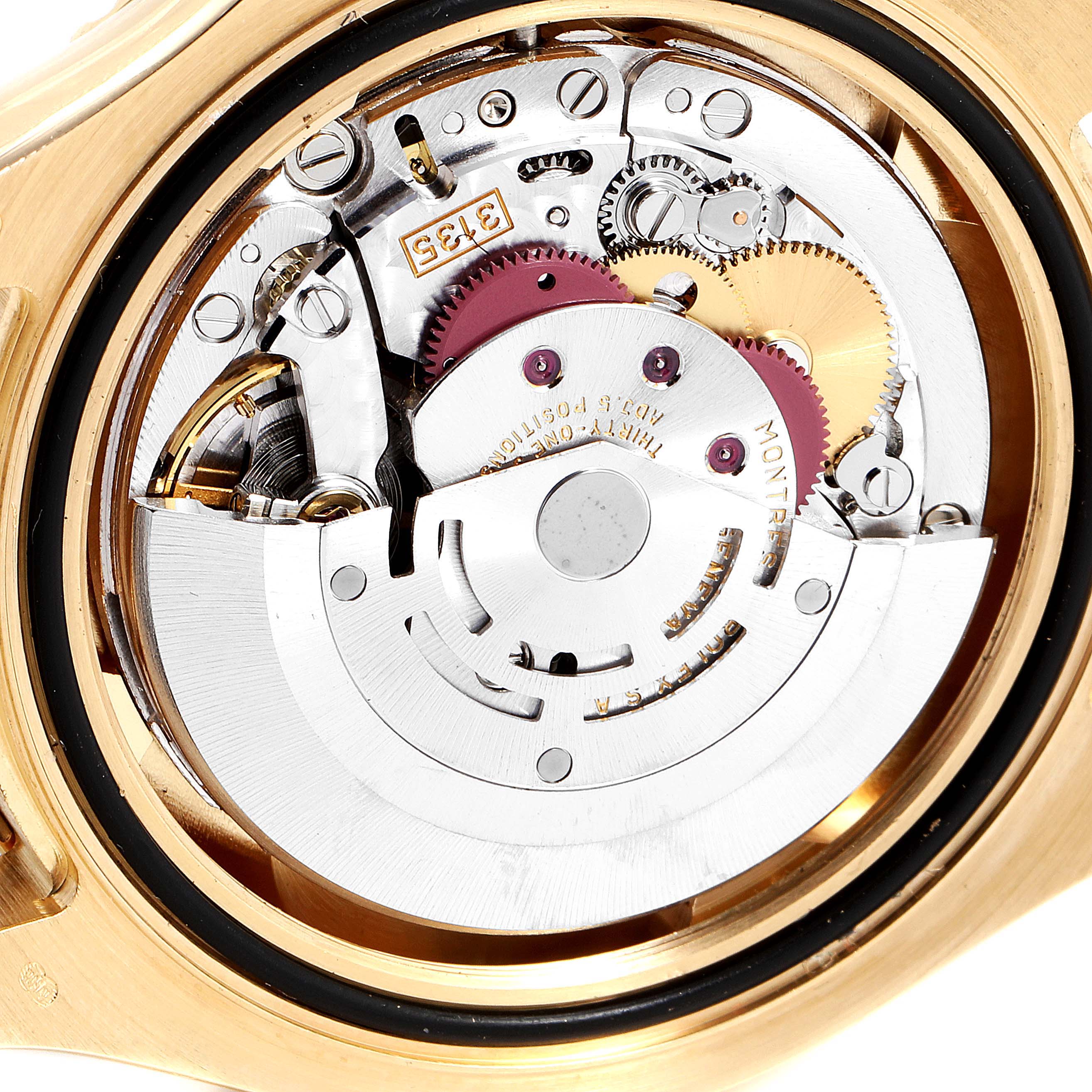 The image shows a close-up of the movement mechanism of a Rolex Yacht-Master 16628 Men's Yellow Gold Blue Dial 16628 Men's Yellow Gold Blue Dial watch from the back.