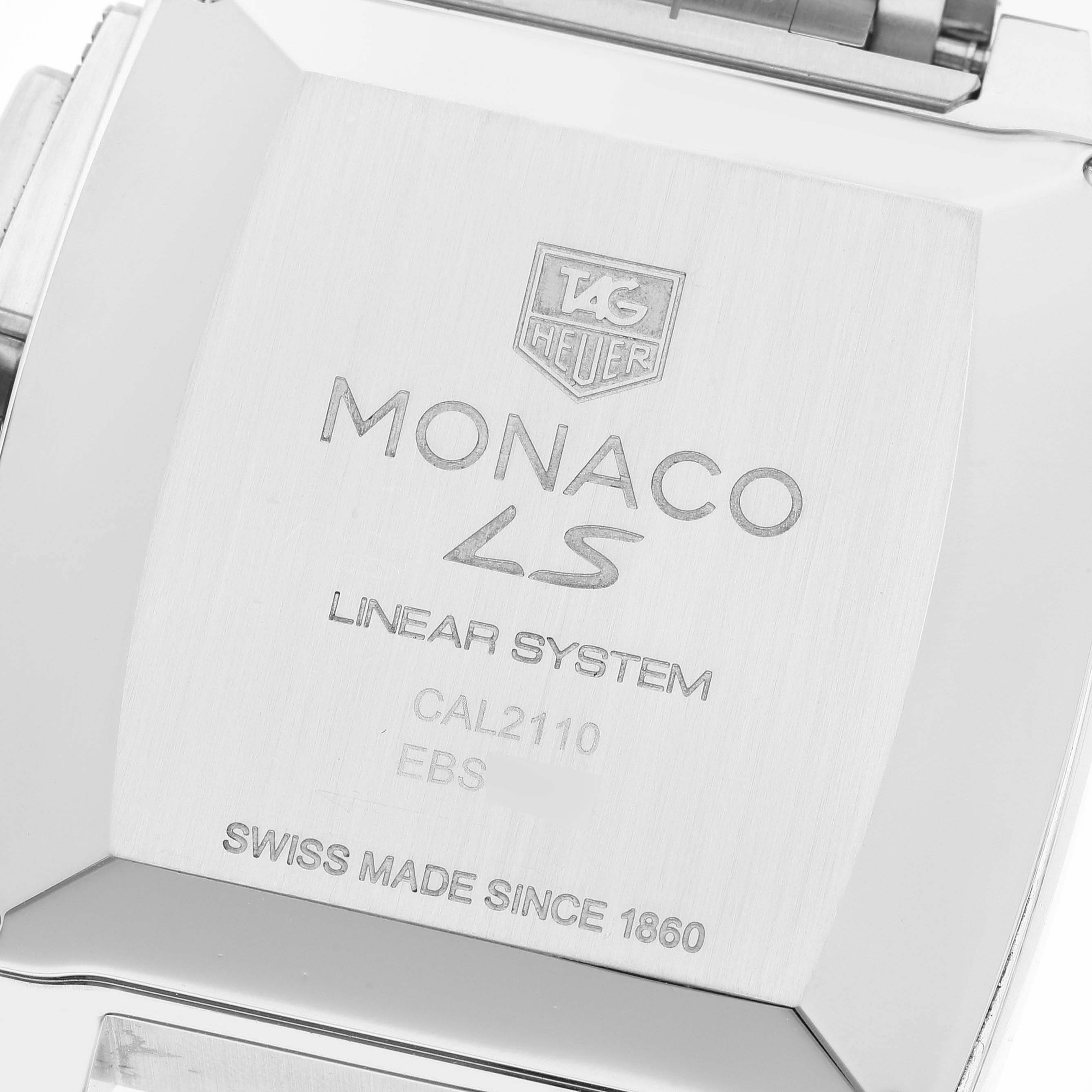 The image shows the back case of a Tag Heuer Monaco CAL2110.BA0781 Men's Stainless Steel Black Dial CAL2110.BA0781 Men's Stainless Steel Black Dial watch, displaying model and branding details.