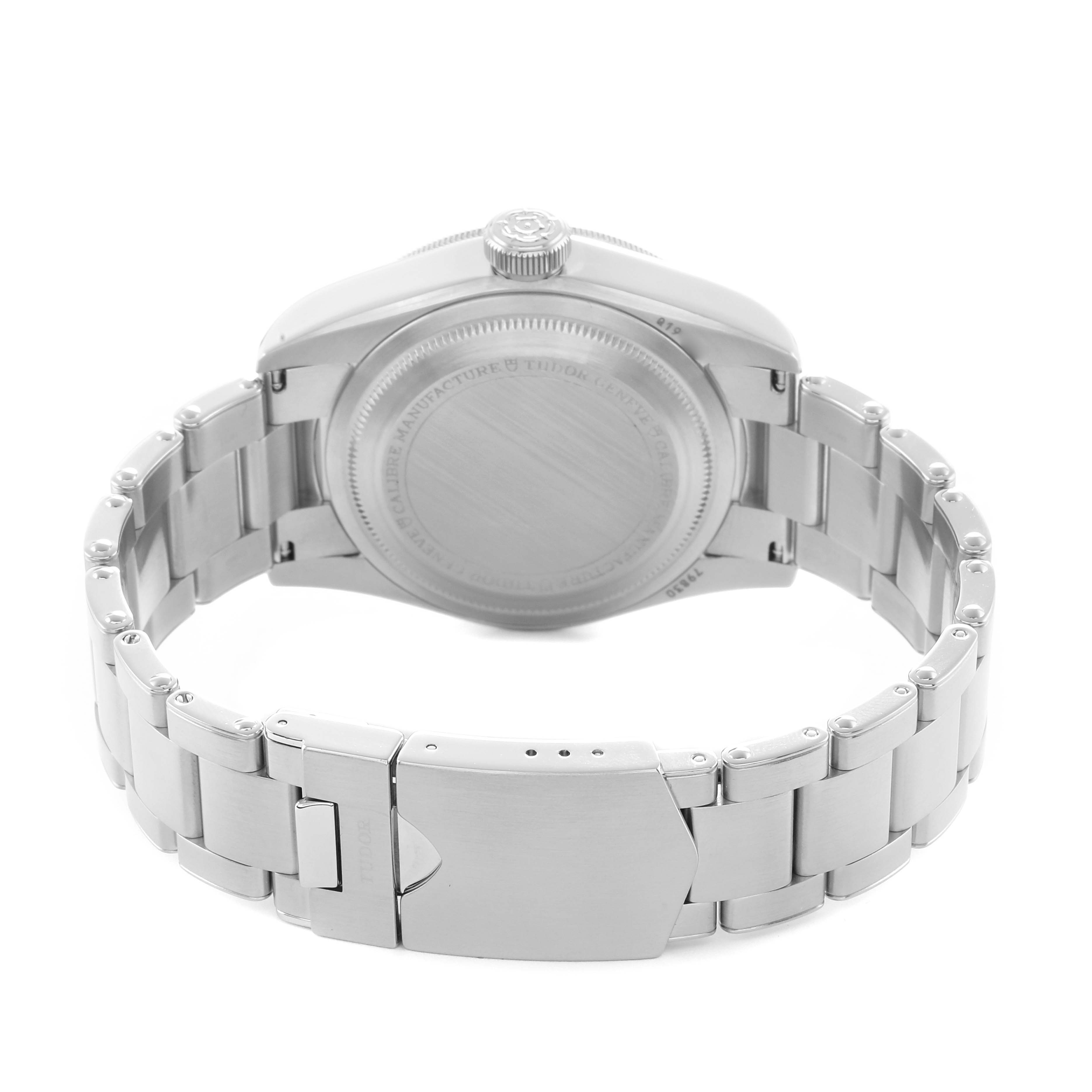 The image shows the back view of the Tudor Heritage Black Bay 79830RB Men
s Stainless Steel Black Dial watch, highlighting the case back and bracelet.