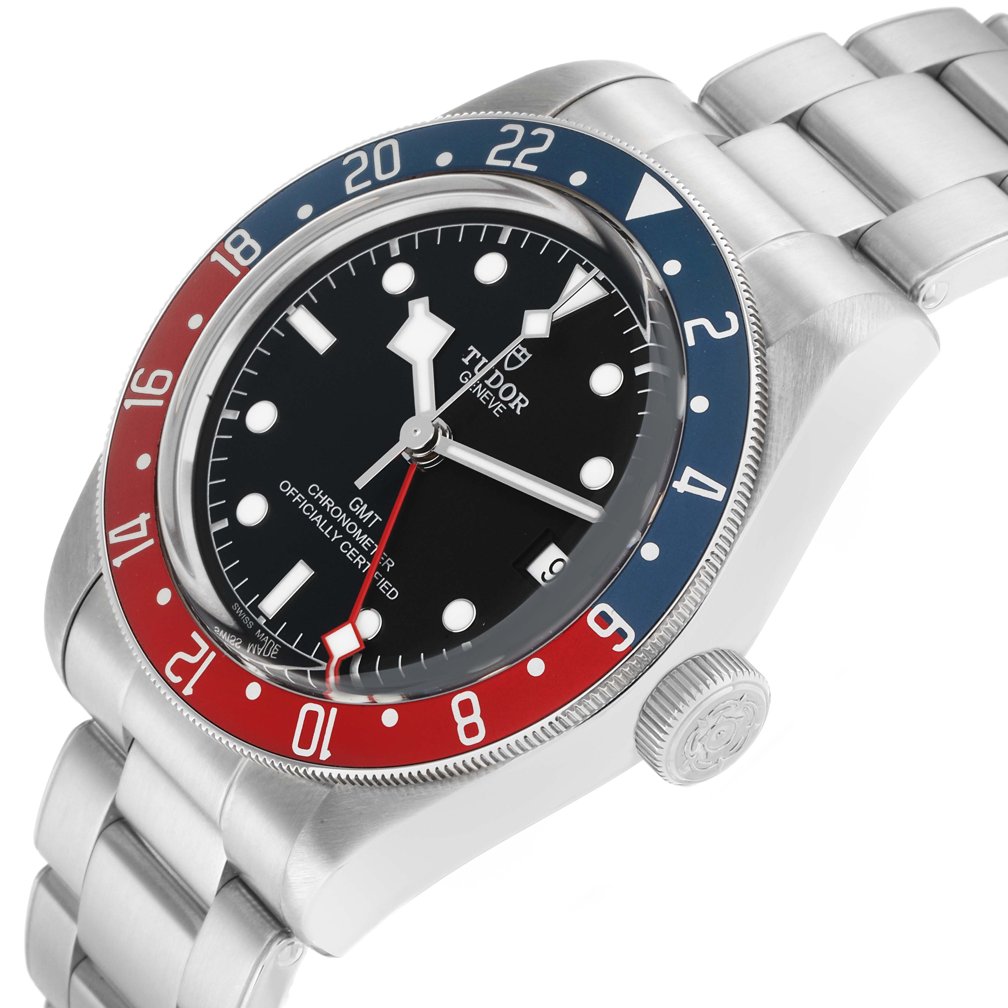 The Tudor Heritage Black Bay 79830RB Men
s Stainless Steel Black Dial is shown at an angled view highlighting the bezel, crown, face, and stainless steel bracelet.