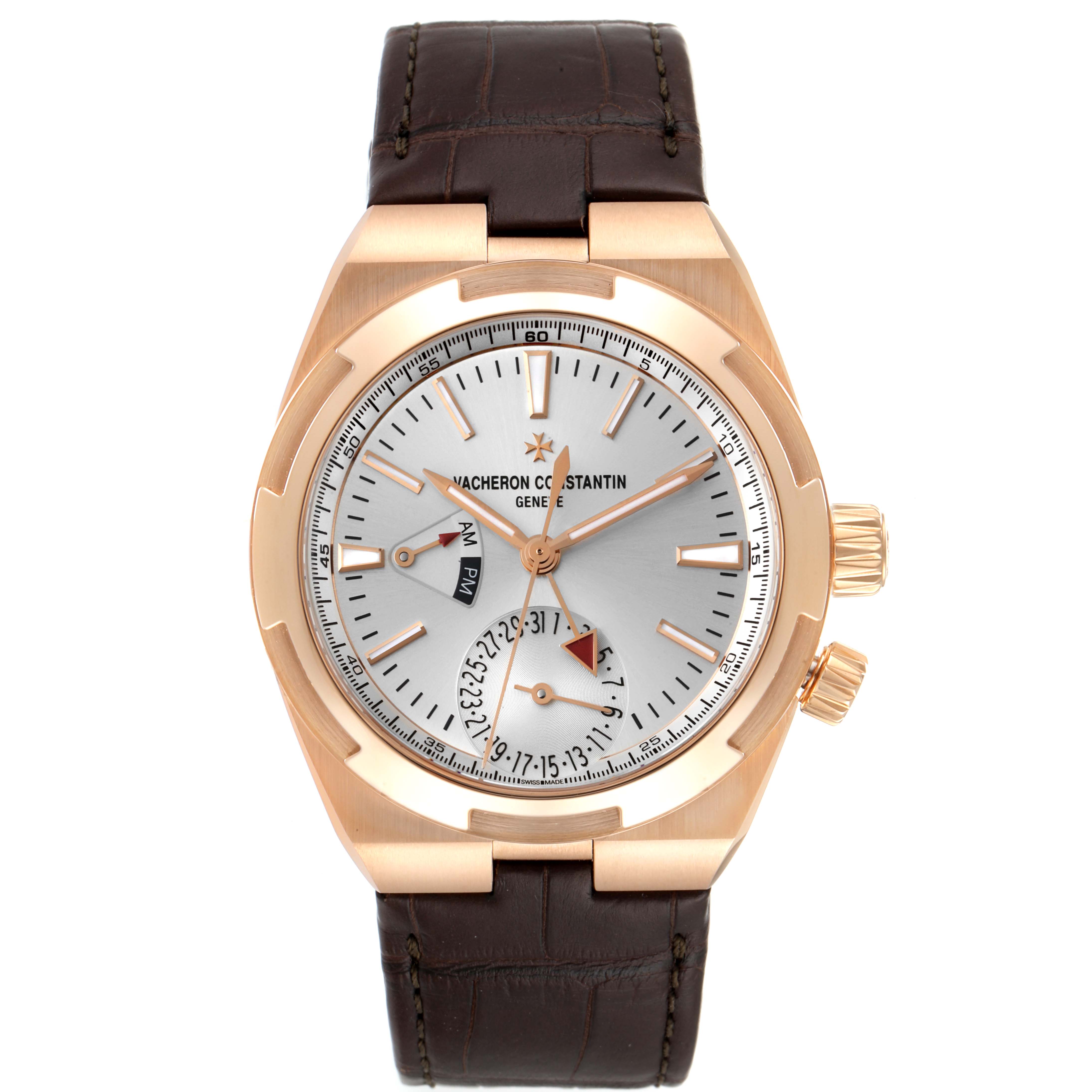The image shows a frontal view of a Vacheron Constantin Overseas 7900V/000R-B336 Men
s Rose Gold Silver Dial 7900V/000R-B336 Men
s Rose Gold Silver Dial watch, highlighting its brown leather strap and gold casing.