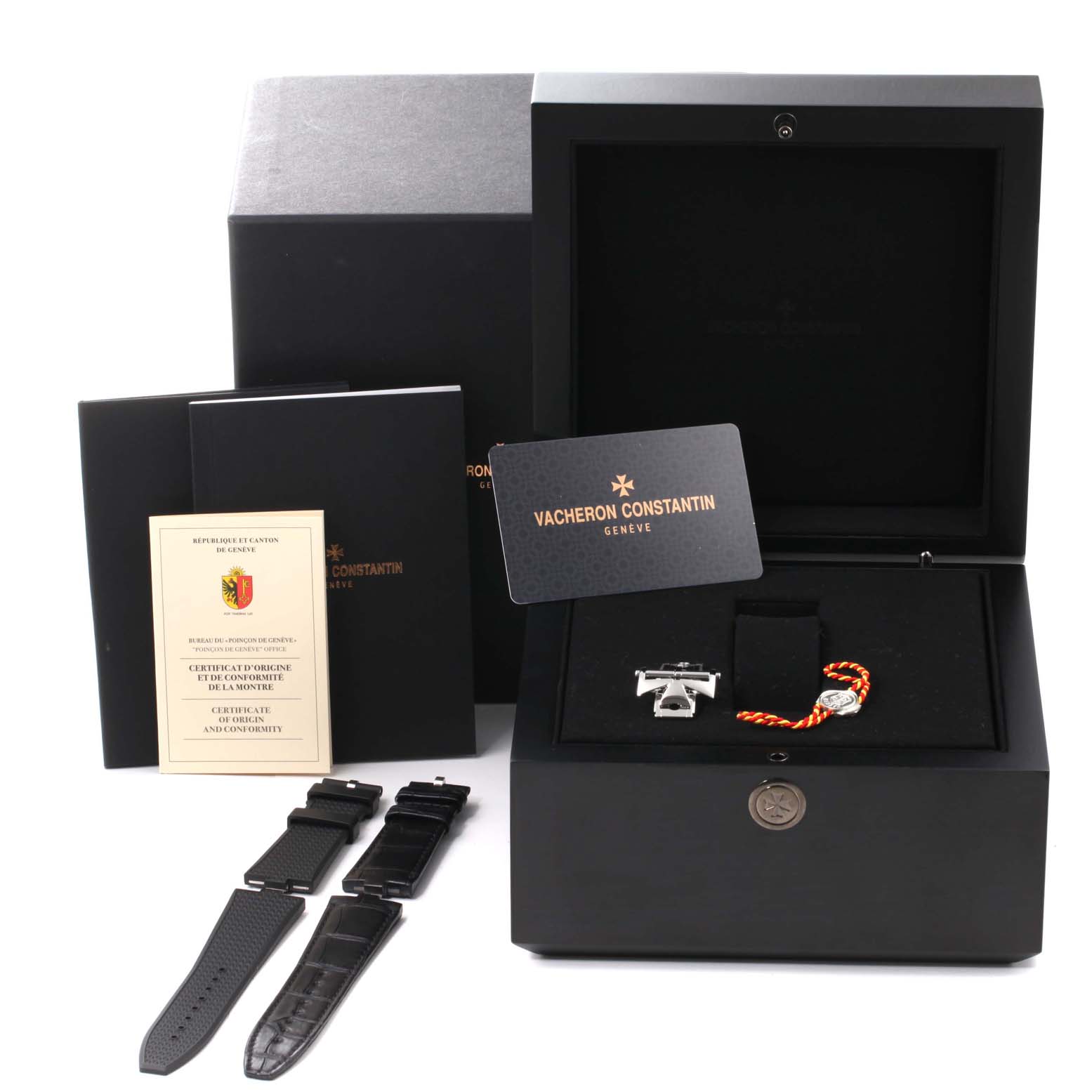 The image shows the Vacheron Constantin Overseas 4500V/110A-B126 Men
s Stainless Steel Silver Dial 4500V/110A-B126 Men
s Stainless Steel Silver Dial watch accessories and packaging, including straps, documentation, and a presentation box.