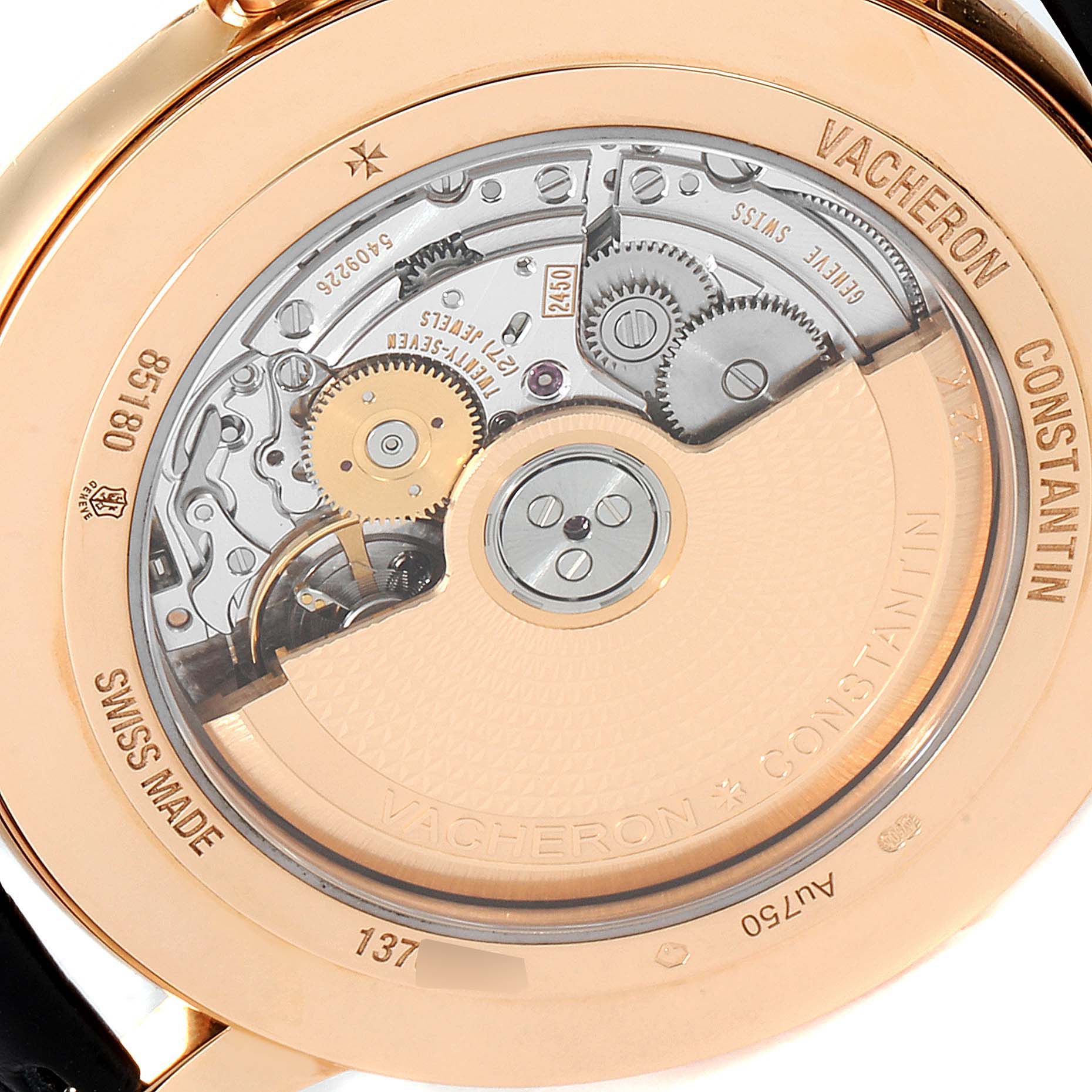 The image shows the back view of a Vacheron Constantin Patrimony 85180/000R-9166 Men's Rose Gold Grey Dial 85180/000R-9166 Men's Rose Gold Grey Dial watch, highlighting its intricate mechanical movement.
