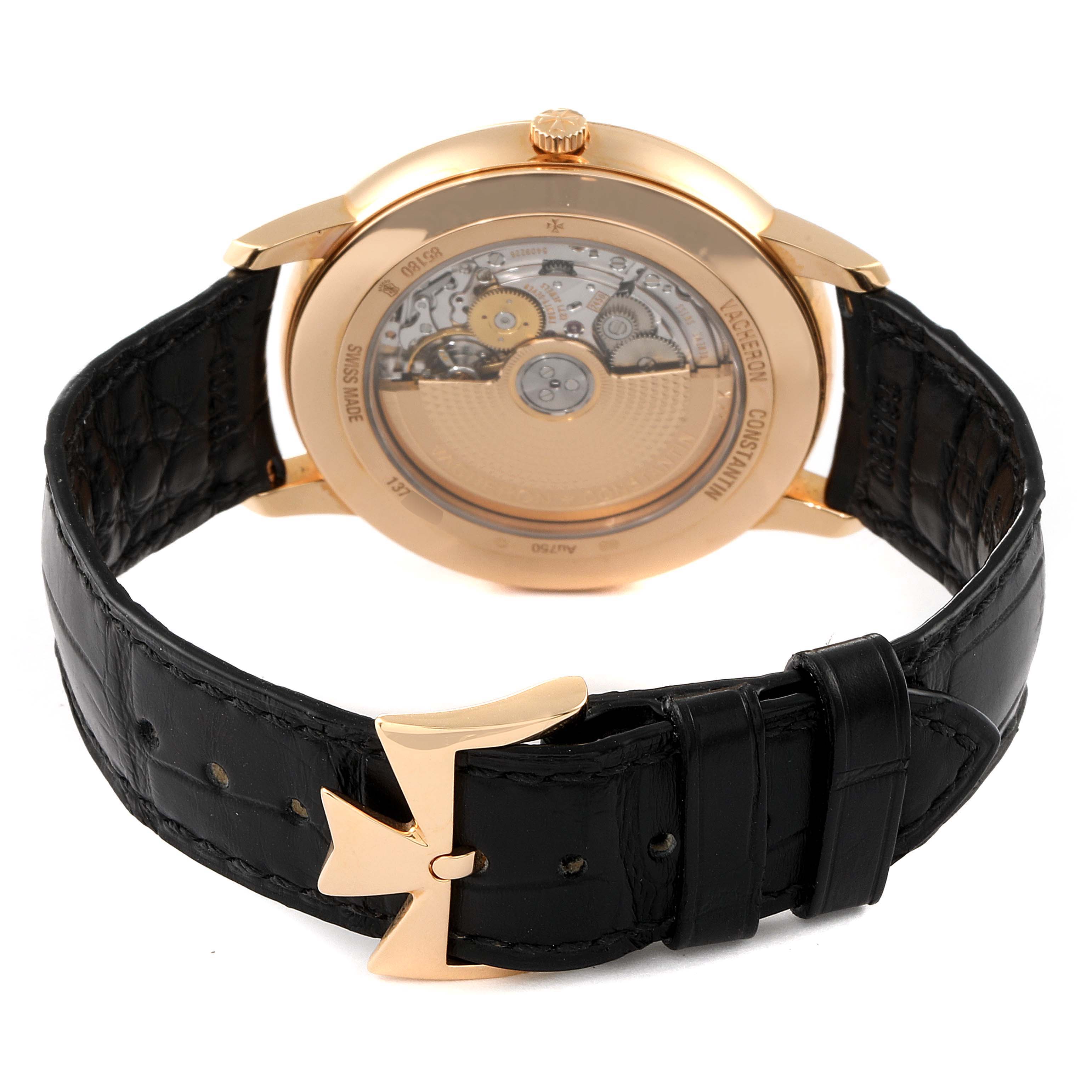 The image shows the back view of the Vacheron Constantin Patrimony 85180/000R-9166 Men's Rose Gold Grey Dial 85180/000R-9166 Men's Rose Gold Grey Dial watch, highlighting its movement and black leather strap.