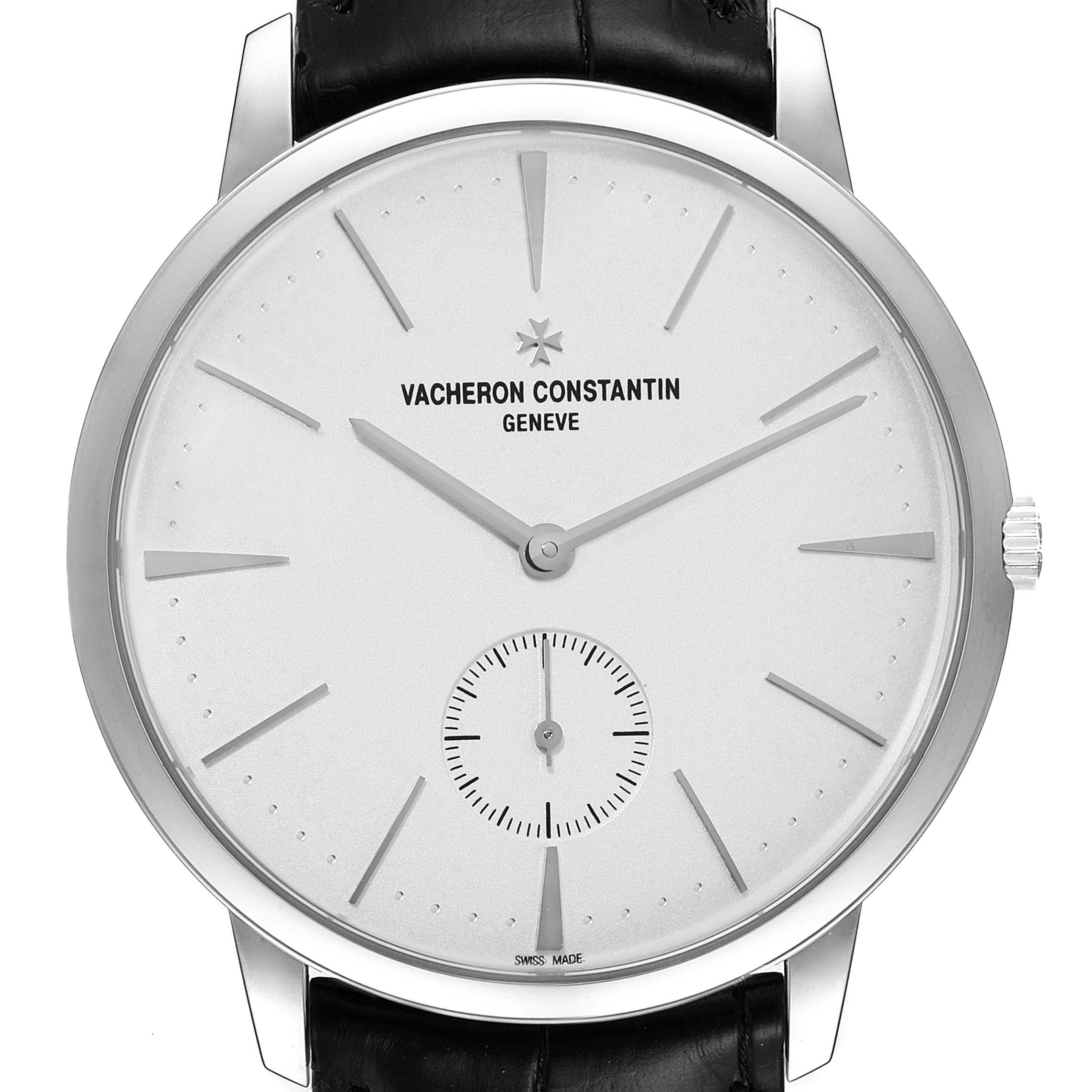 The image shows a frontal view of the Patrimony watch by Vacheron Constantin, highlighting the dial, hands, and leather strap parts.
