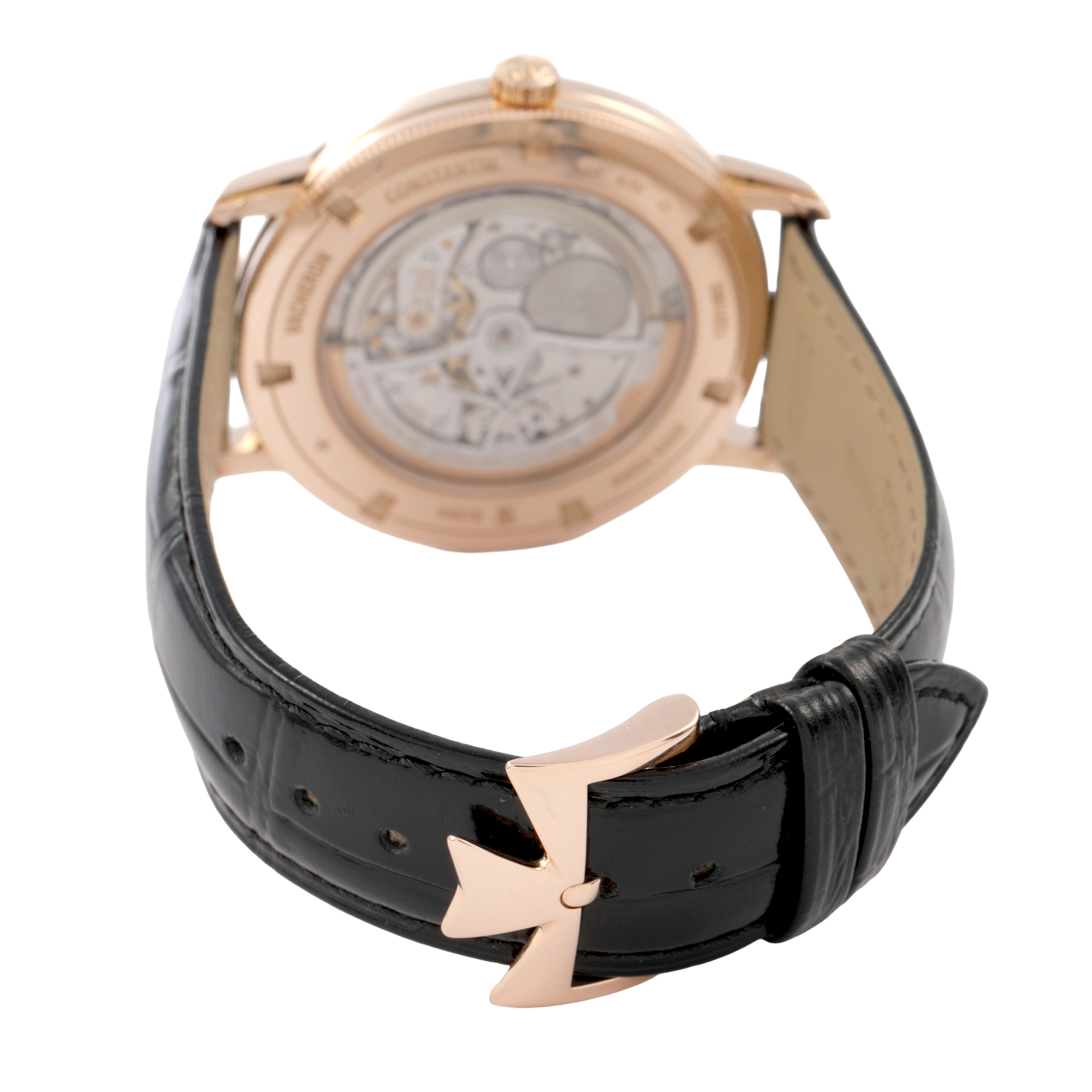 The Vacheron Constantin Patrimony 43075/000R-9737 Men's Rose Gold Silver Dial watch is shown from the back, highlighting the case back and leather strap with a distinct clasp.