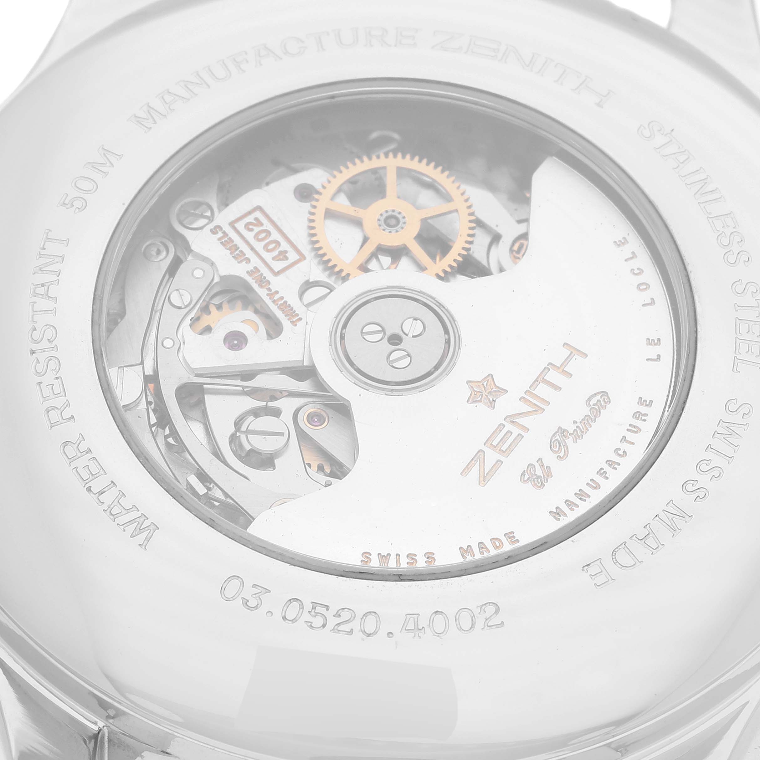 The image shows the back view of the Zenith El Primero 03.0520.4002/21.R511 Men's Stainless Steel Black Dial 03.0520.4002/21.R511 Men's Stainless Steel Black Dial watch, revealing its intricate movement and engraved details.