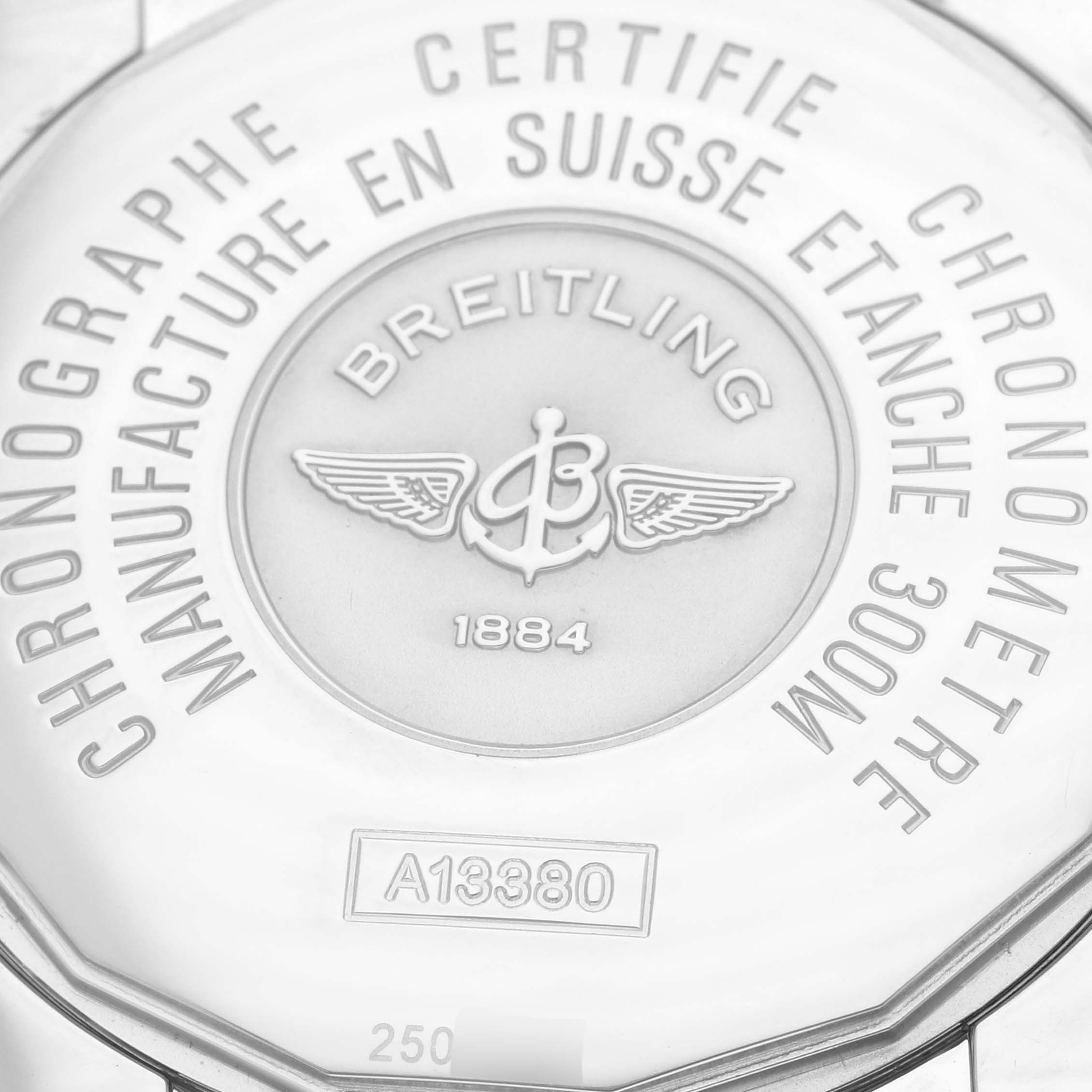 The image shows the case back of a Breitling Avenger A13380 Men's Stainless Steel Blue Dial A13380 Men's Stainless Steel Blue Dial watch with engravings and logo details.