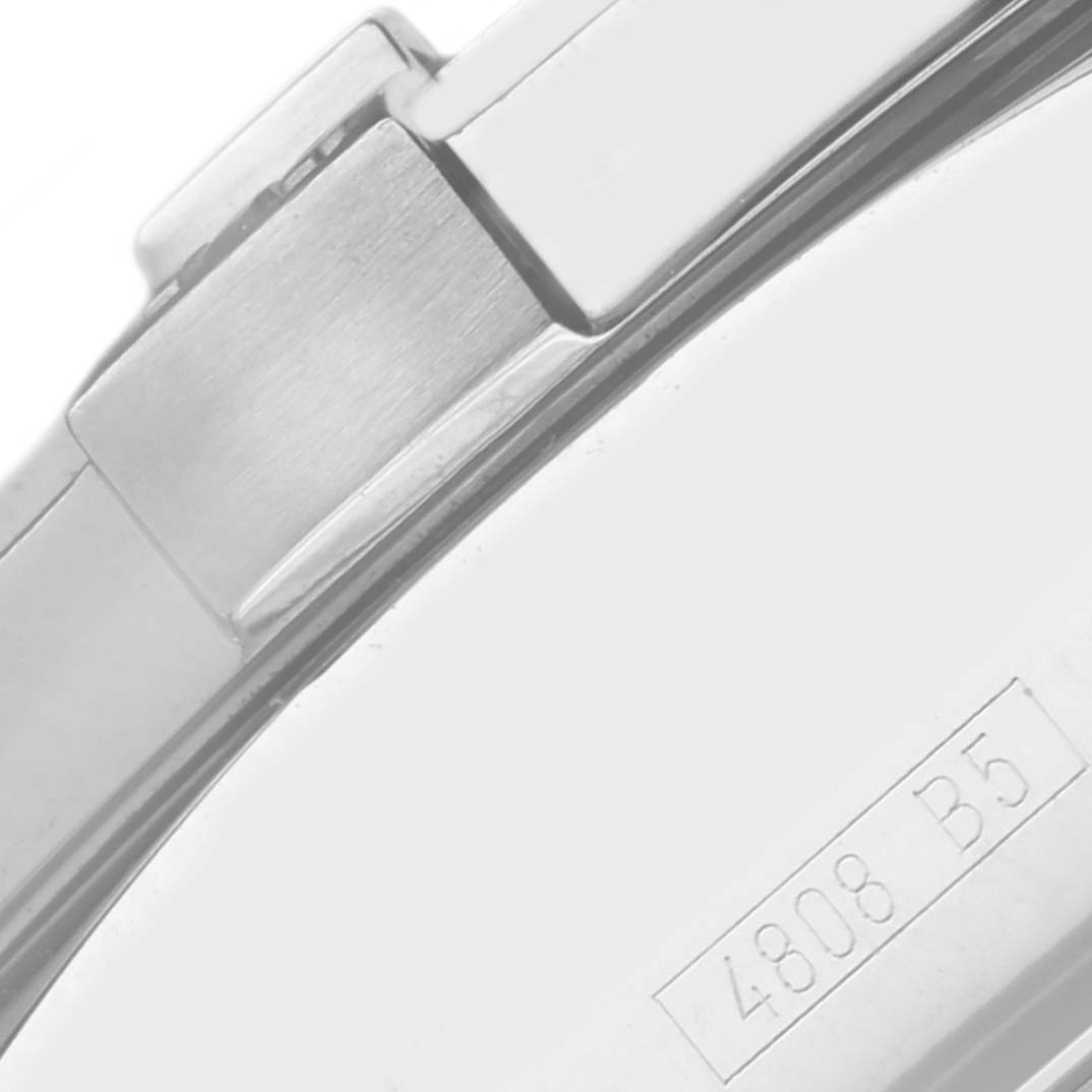 The image shows a close-up of the clasp and part of the metal bracelet of a Breitling Avenger A13380 Men's Stainless Steel Blue Dial A13380 Men's Stainless Steel Blue Dial watch.