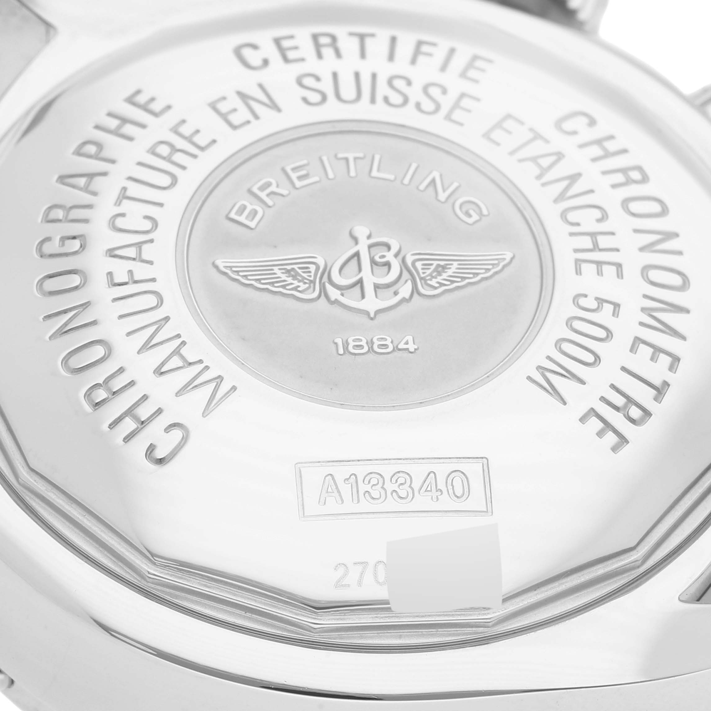 This is the backside of a Breitling Superocean A13340 Men's Stainless Steel Black Dial A13340 Men's Stainless Steel Black Dial watch, showing the engraved model details and branding.