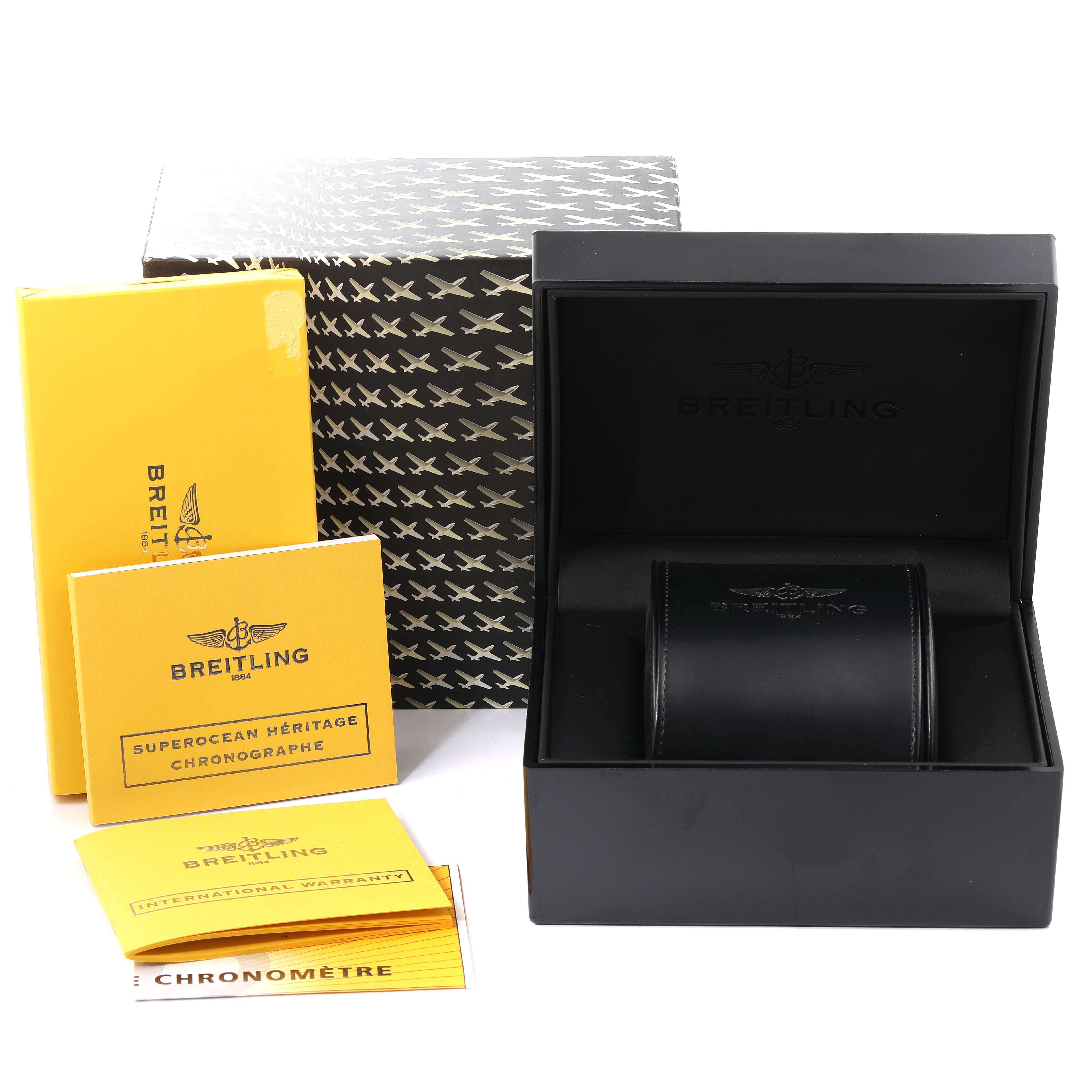 The image shows a Breitling Superocean A13320 Men's Stainless Steel Black Dial A13320 Men's Stainless Steel Black Dial packaging, including a box, booklet, warranty, and watch case.