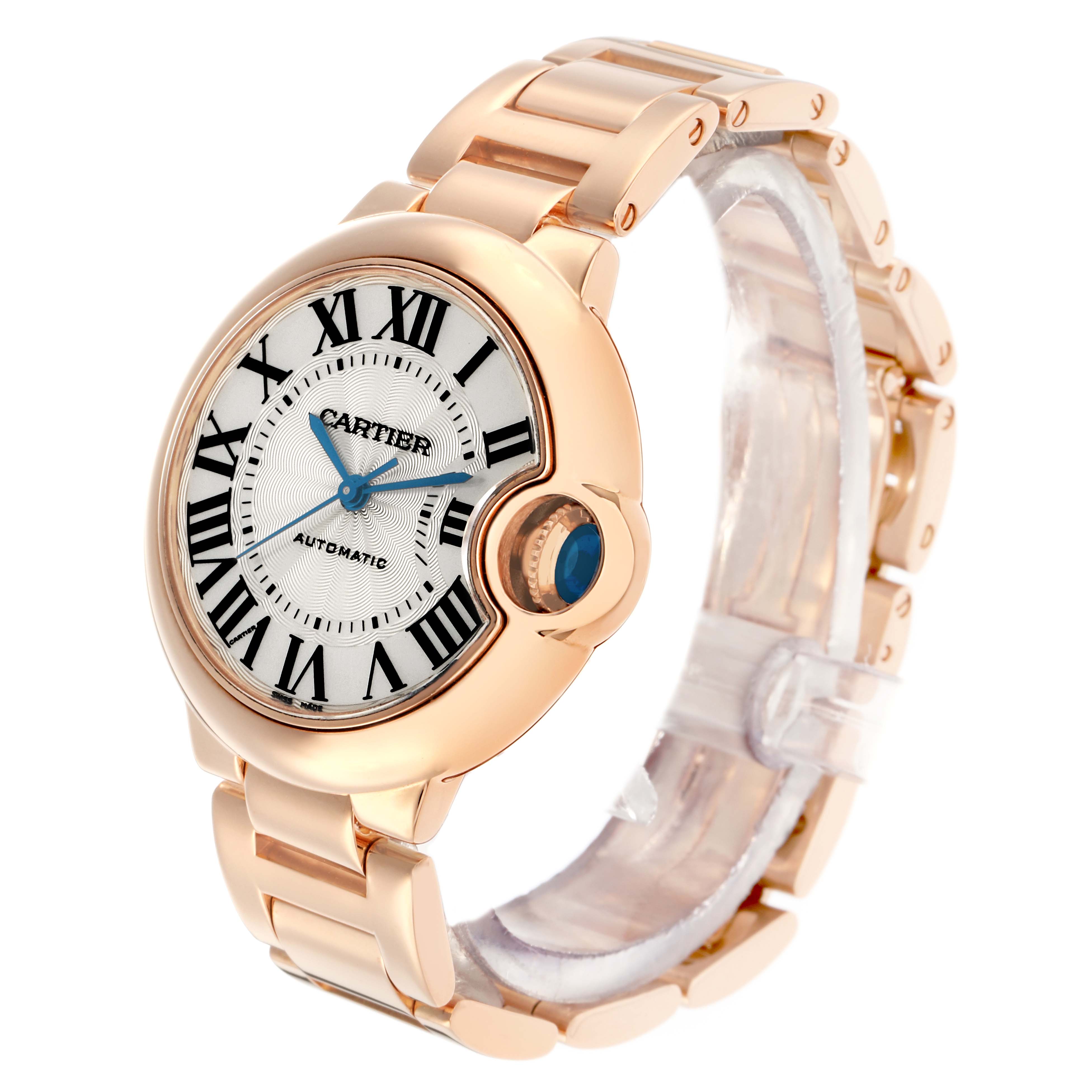 The Cartier Ballon Bleu W6920096 Women
s Rose Gold Silver Dial watch is shown at a three-quarter angle, highlighting the face, bezel, and bracelet.