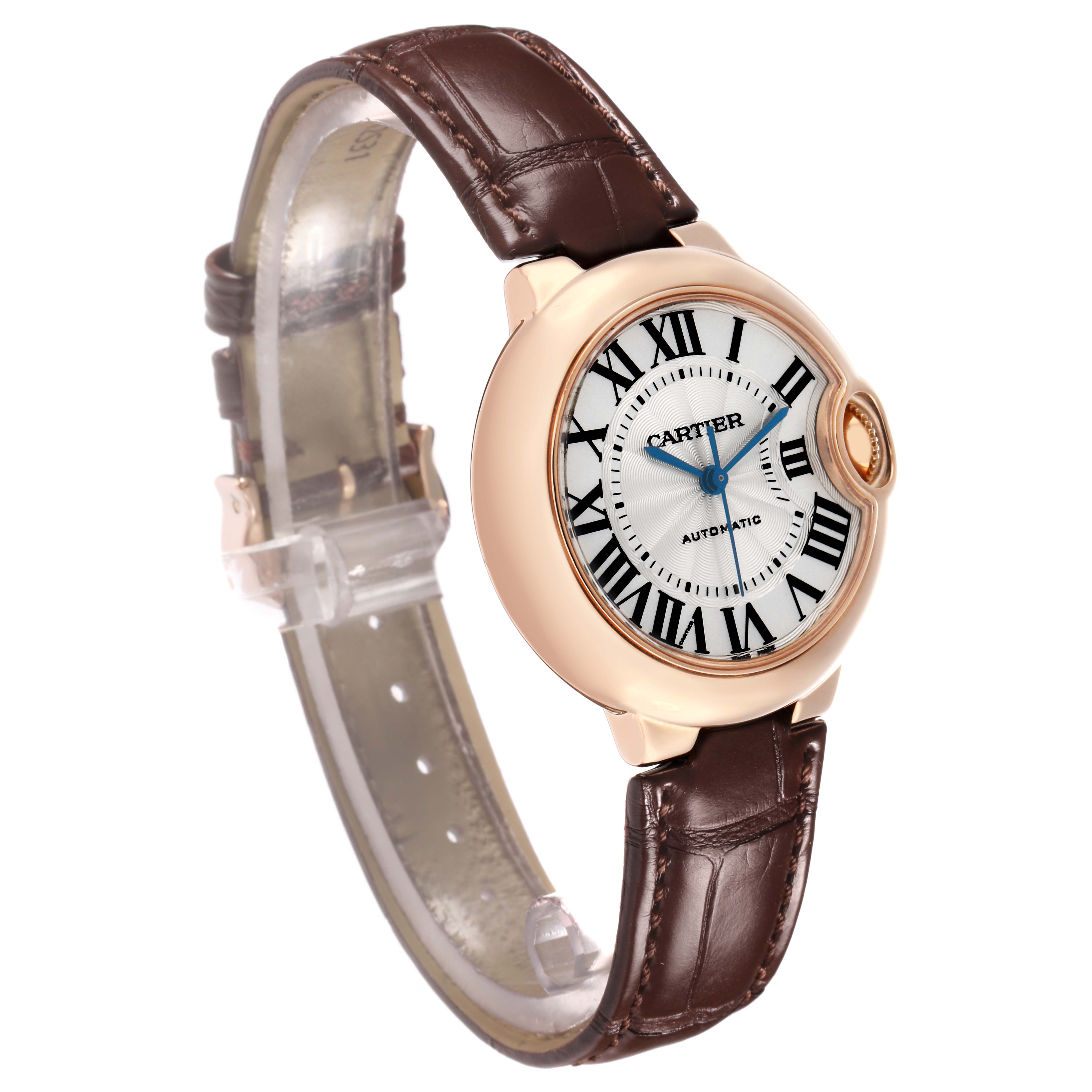 The Cartier Ballon Bleu W6920097 Women's Rose Gold Silver Dial watch is shown at a three-quarter angle, highlighting the dial and leather strap.