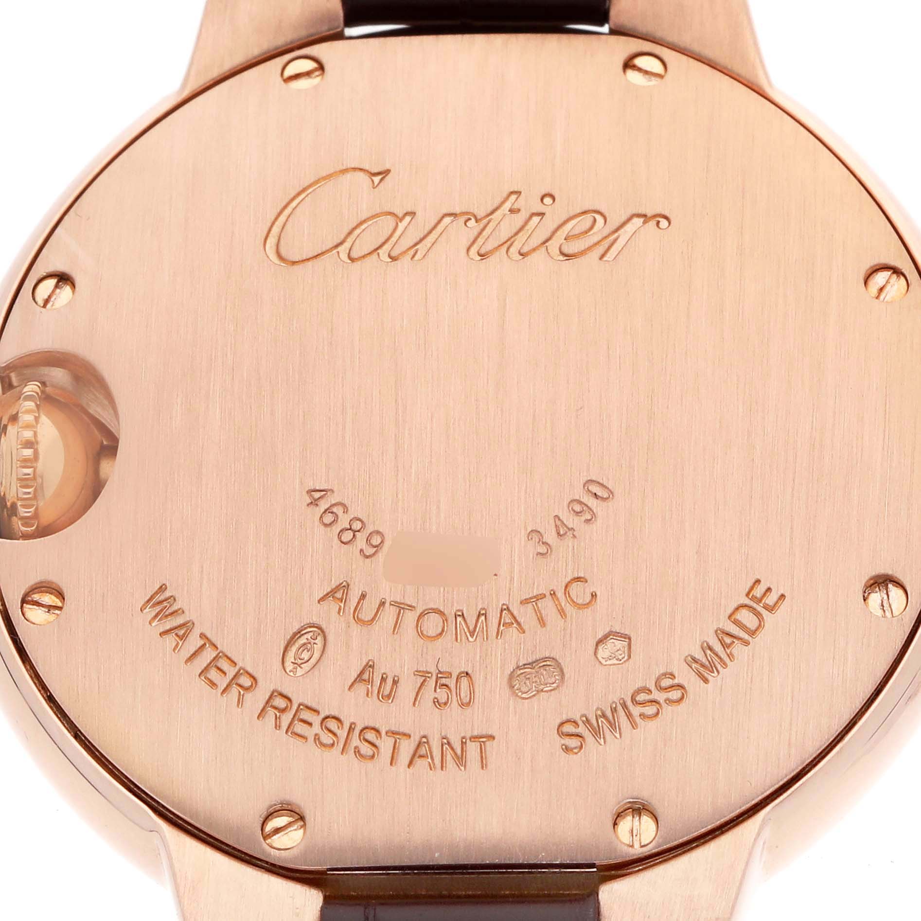 The image shows the back case of a Cartier Ballon Bleu W6920097 Women's Rose Gold Silver Dial watch, highlighting the engraved brand, model, and specifications.