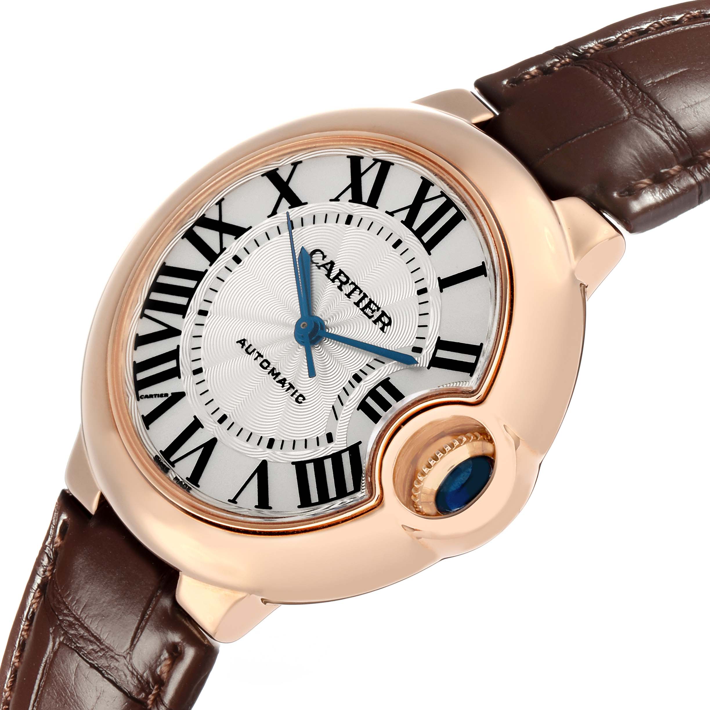 The Cartier Ballon Bleu W6920097 Women's Rose Gold Silver Dial watch is shown at a tilted angle, displaying the face, crown, case, and part of the leather strap.