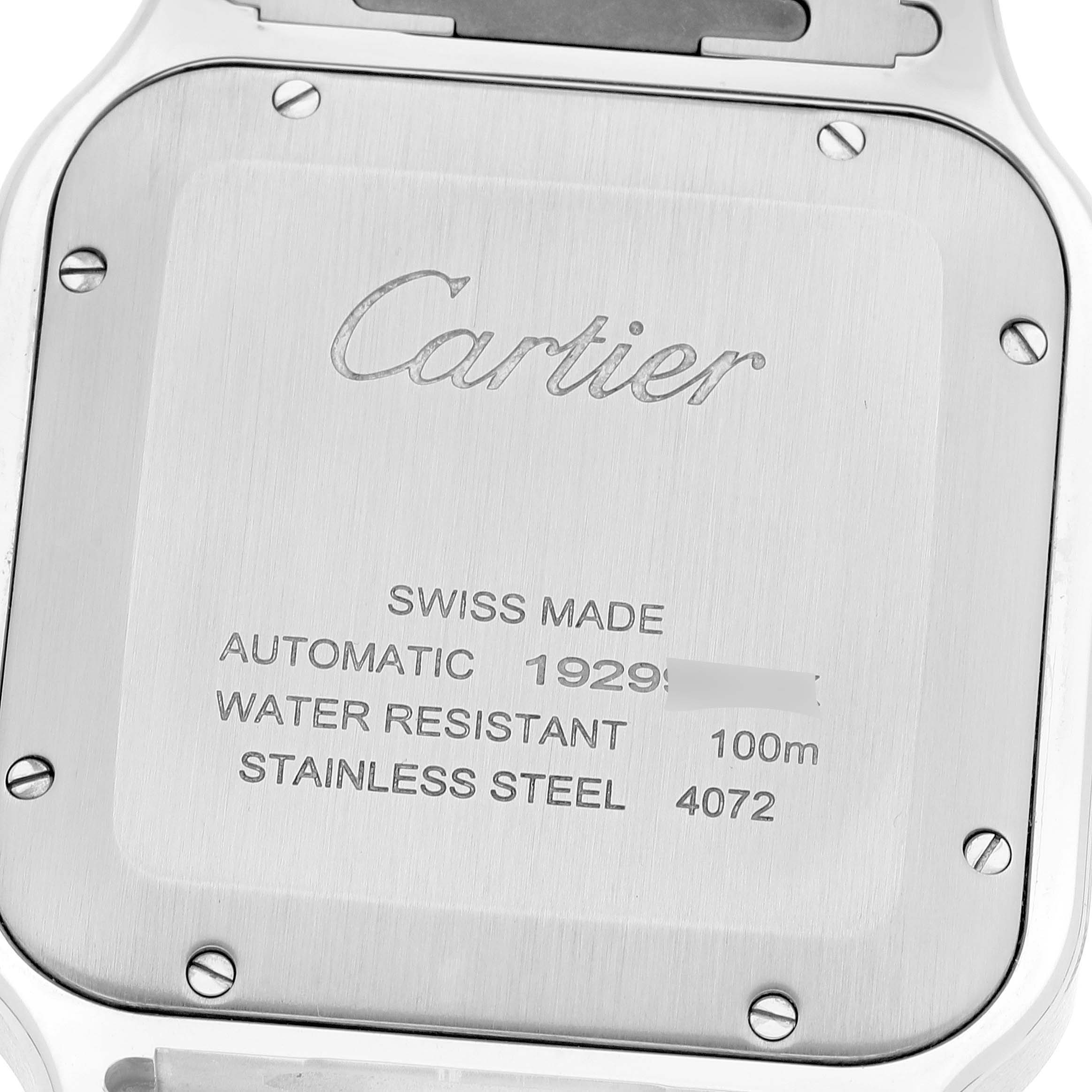 This image shows the back case of a Cartier Santos WSSA0047 Men
s Stainless Steel Silver Dial WSSA0047 Men
s Stainless Steel Silver Dial model watch, focusing on its detailed engravings.