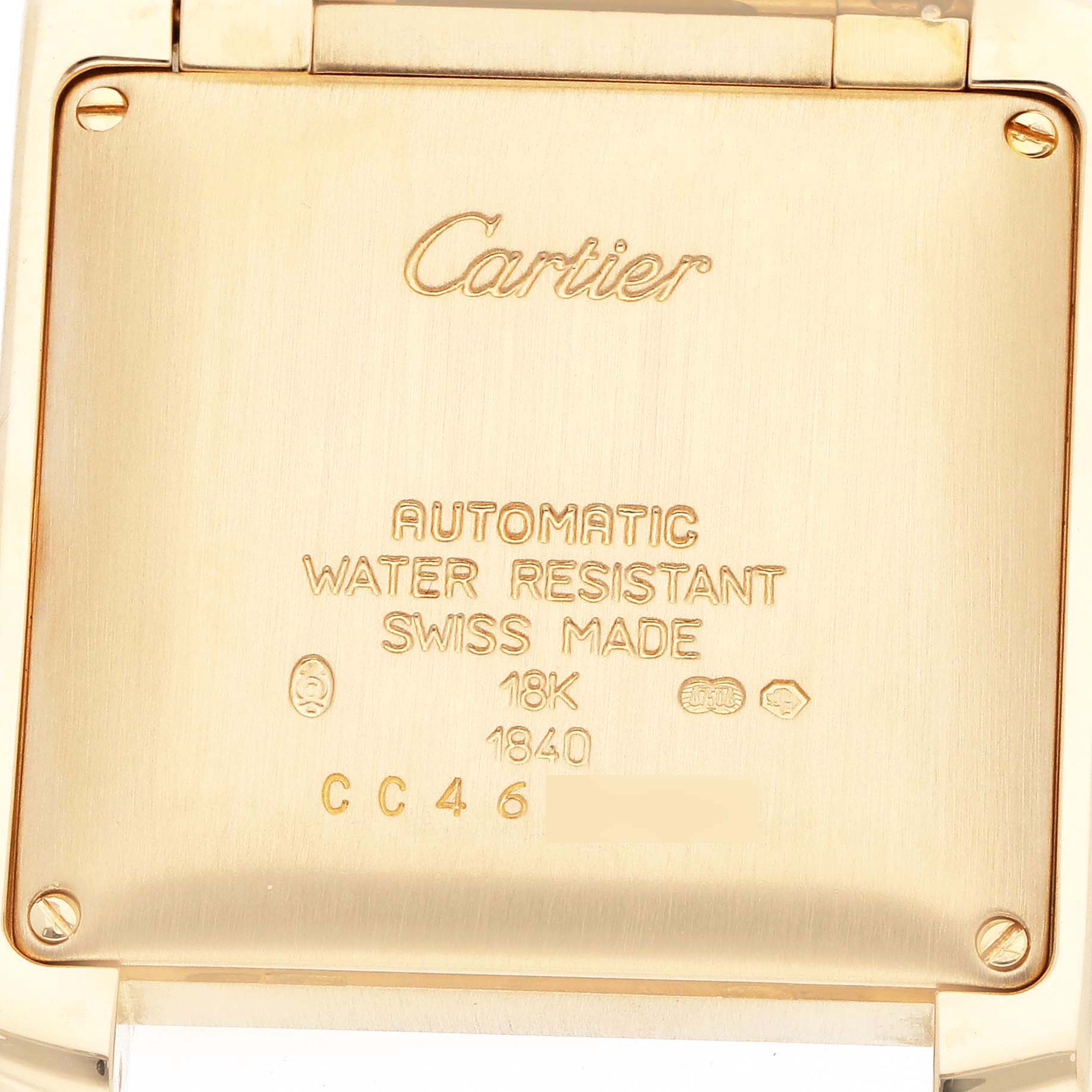 The image shows the back of a Cartier Tank Française watch, highlighting the engraved design and specifications.