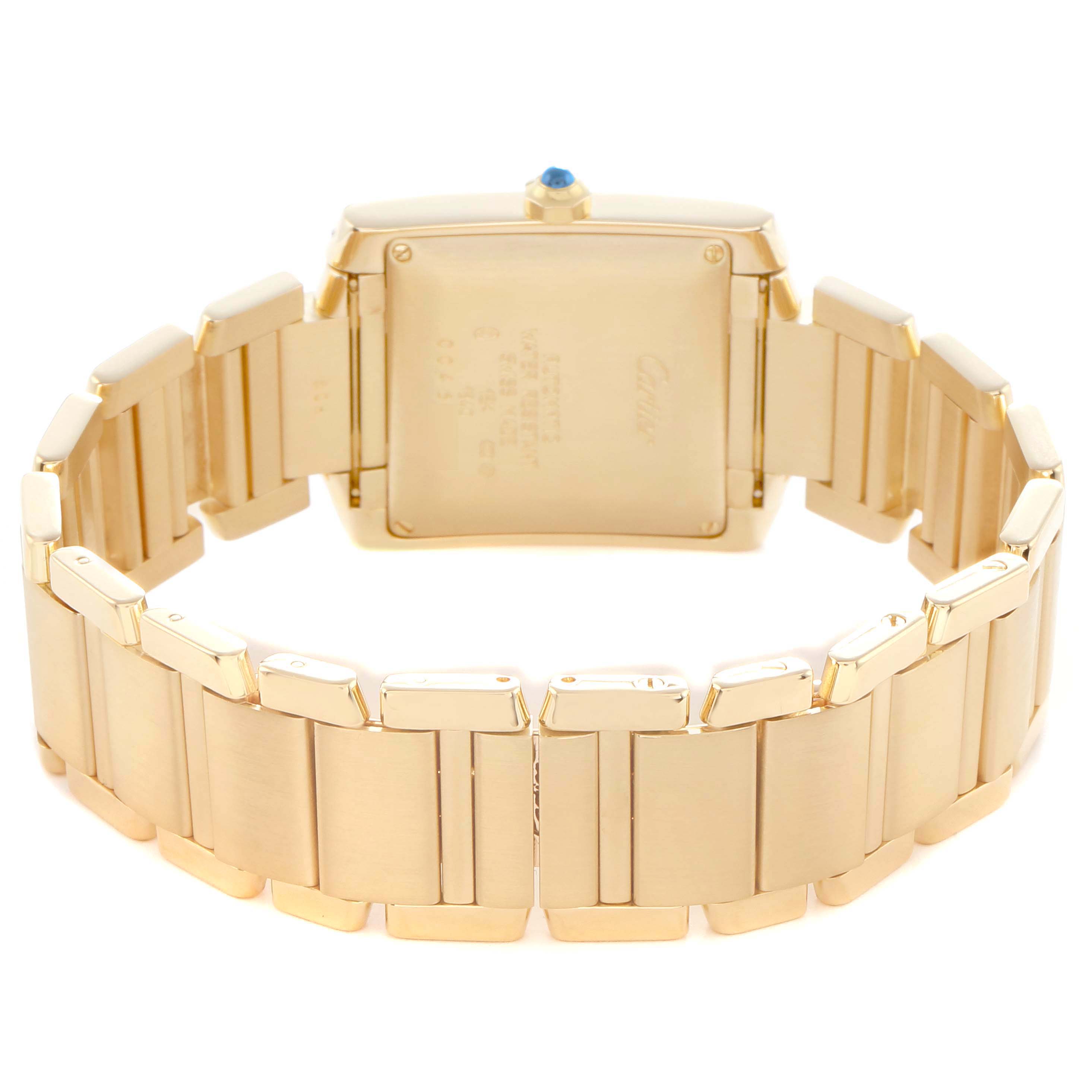 The image shows the back view of a Cartier Tank Française watch, highlighting the gold bracelet and case back.