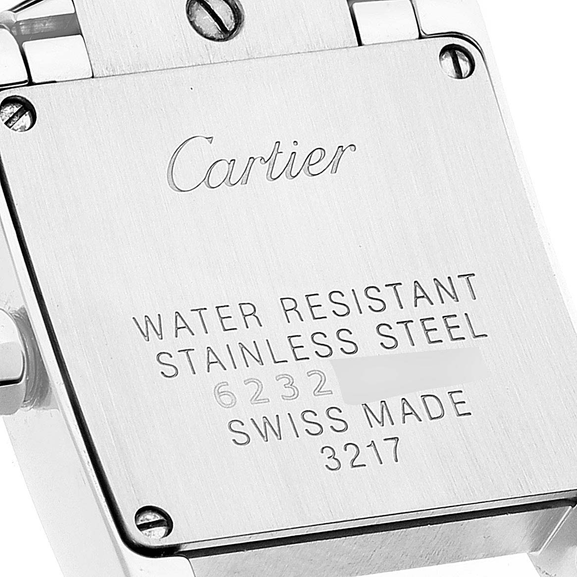 This image shows the back case of a Cartier Tank Française watch, highlighting the brand engraving and specifications.