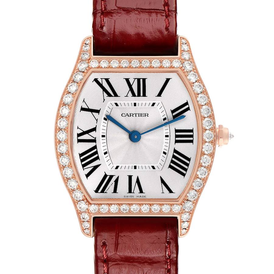 The Cartier Tortue WA501008 Women's Rose Gold Silver Dial watch is shown from a top-down angle, highlighting its diamond-encrusted bezel and Roman numeral dial.
