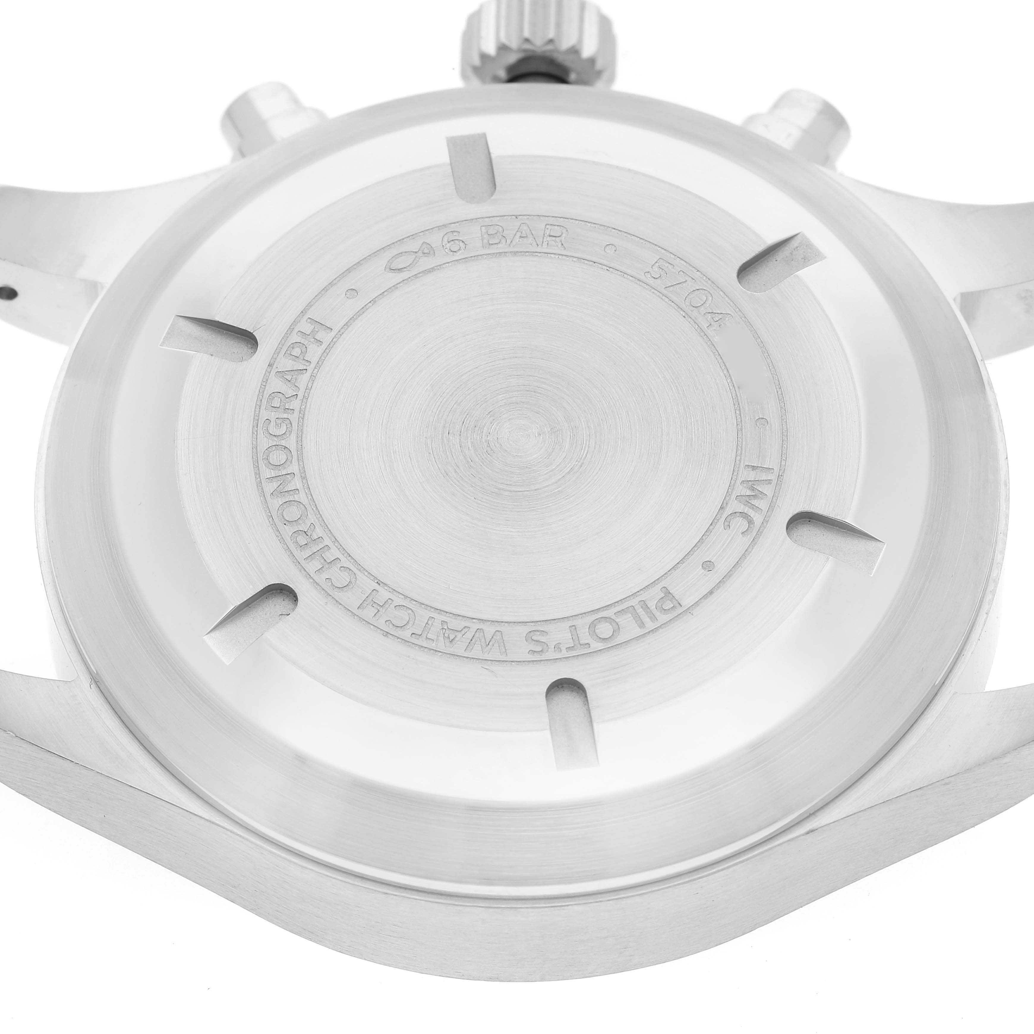 The image shows a close-up of the case back and crown of the IWC Pilot IW377724 Men's Stainless Steel Black Dial IW377724 Men's Stainless Steel Black Dial's Watch.