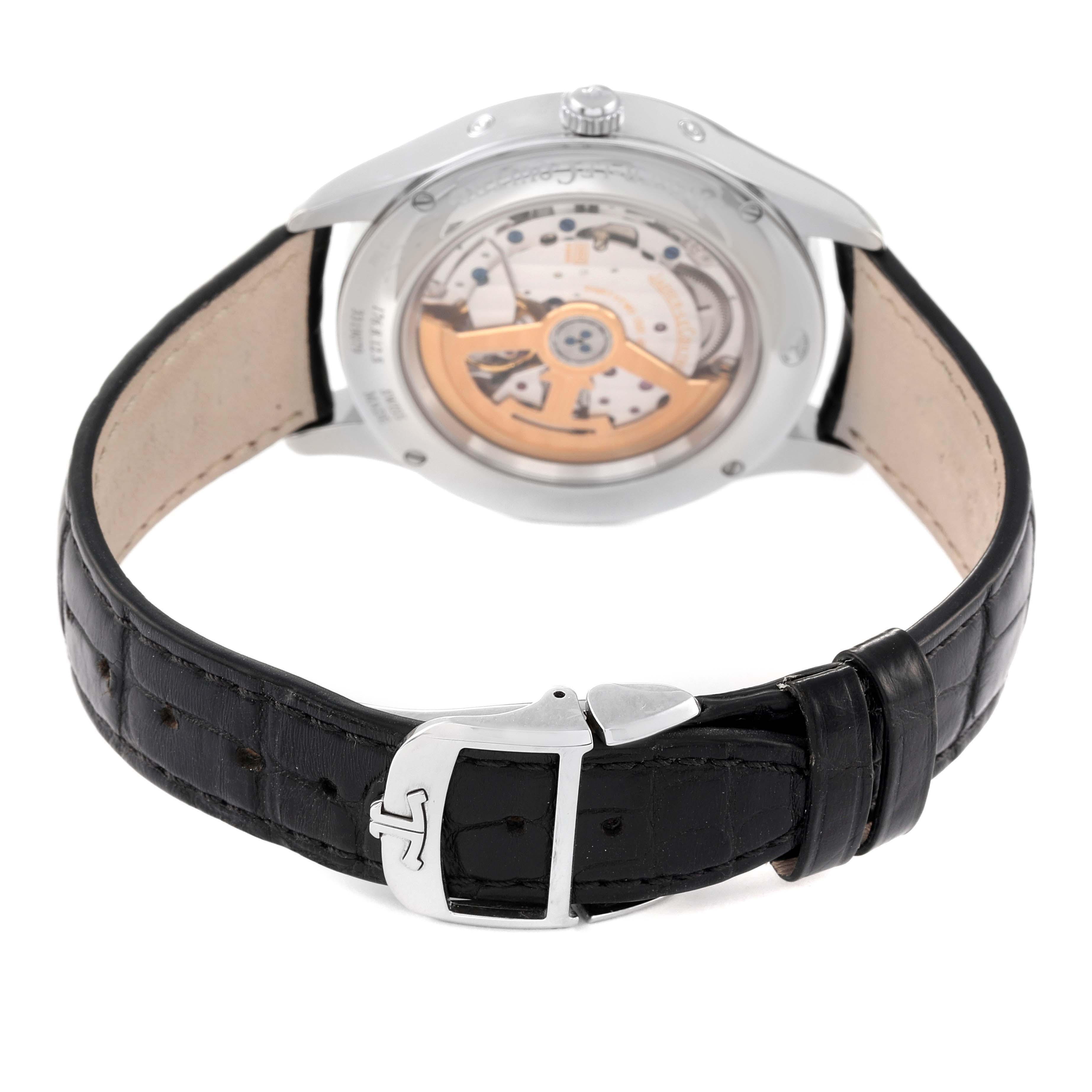 The image shows the back view of a Jaeger LeCoultre Master 176.8.12.S Q1558420 Men's Stainless Steel Silver Dial 176.8.12.S Q1558420 Men's Stainless Steel Silver Dial model watch, displaying its movement and black leather strap.