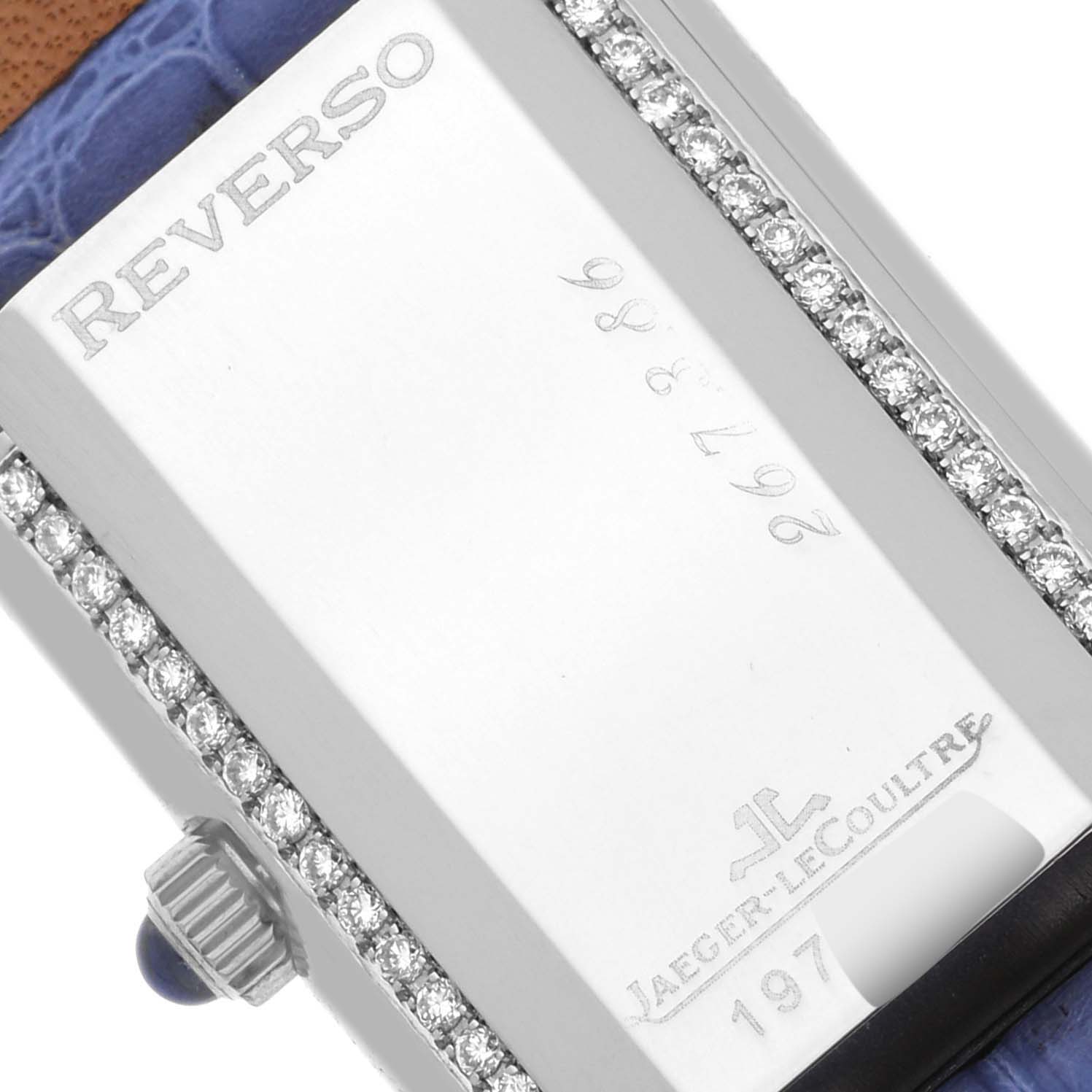 This Jaeger LeCoultre Reverso Q2623403 / 267.3.86 Women's White Gold Silver Dial Q2623403 / 267.3.86 Women's White Gold Silver Dial watch is shown at an angle displaying the back with engravings and decorative elements.