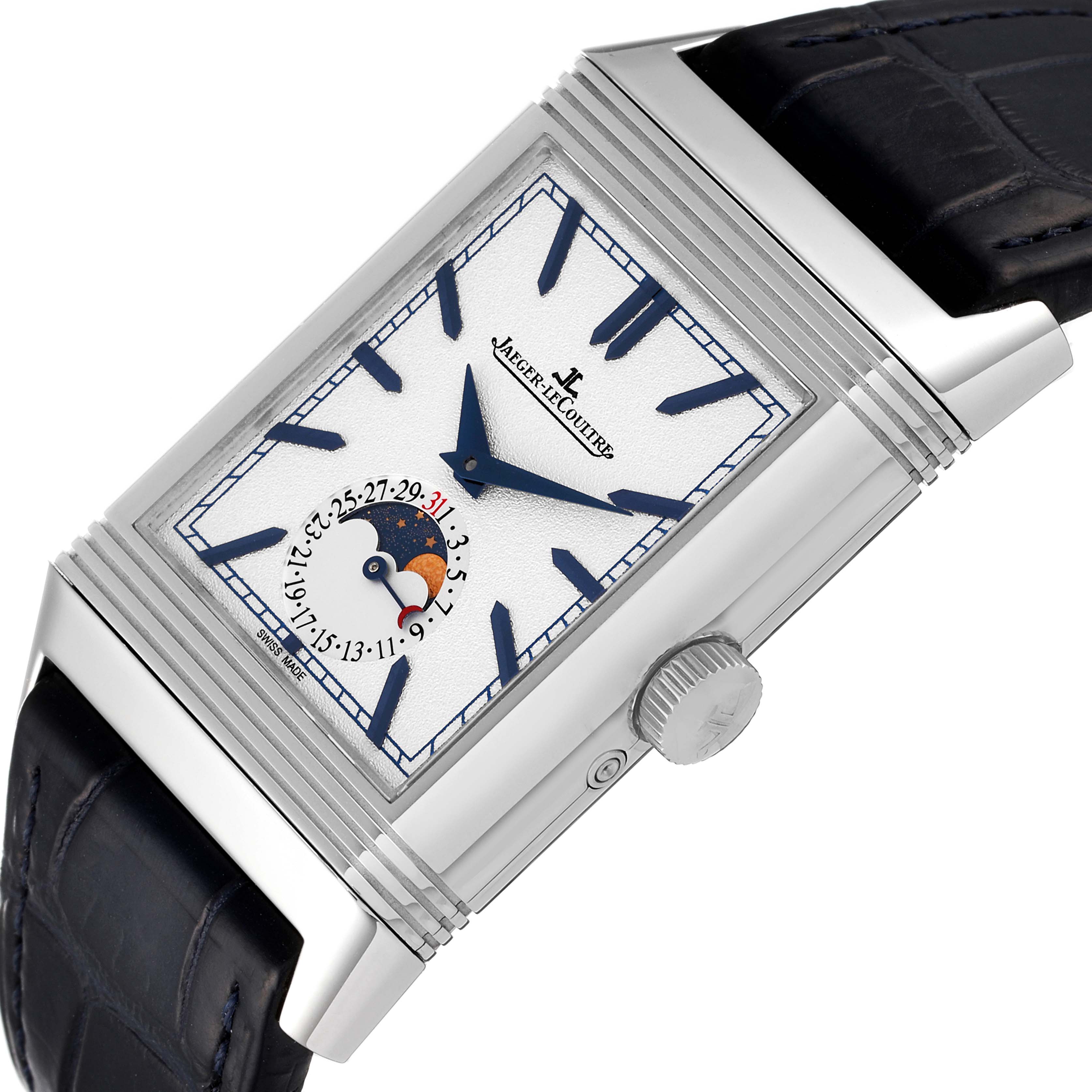The image shows a close-up angled view of the Jaeger-LeCoultre Reverso watch, highlighting the face, crown, and strap.