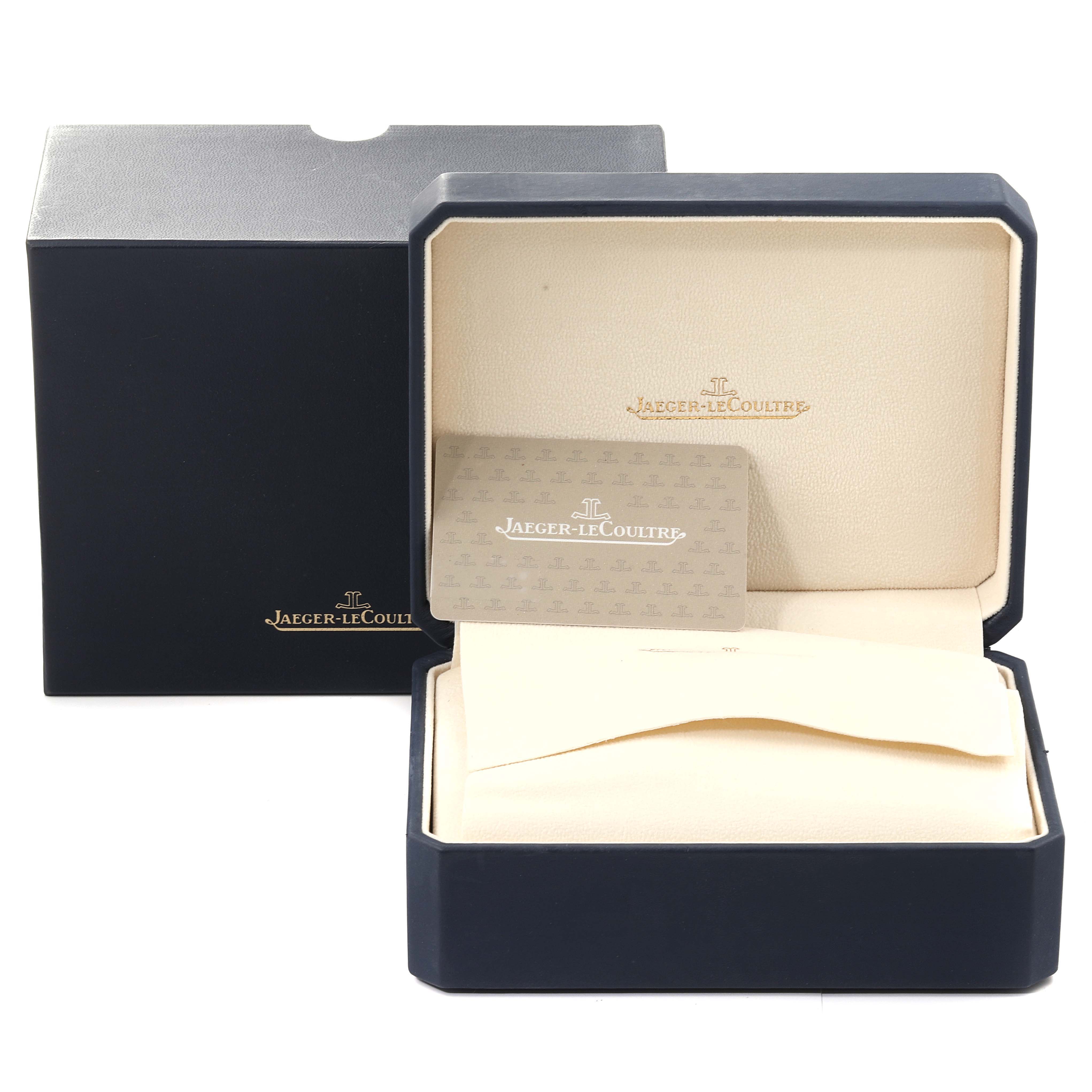 The image shows the open box for a Jaeger LeCoultre Reverso Q3958420 Men's Stainless Steel Blue Dial Q3958420 Men's Stainless Steel Blue Dial watch, along with the warranty card and documentation.