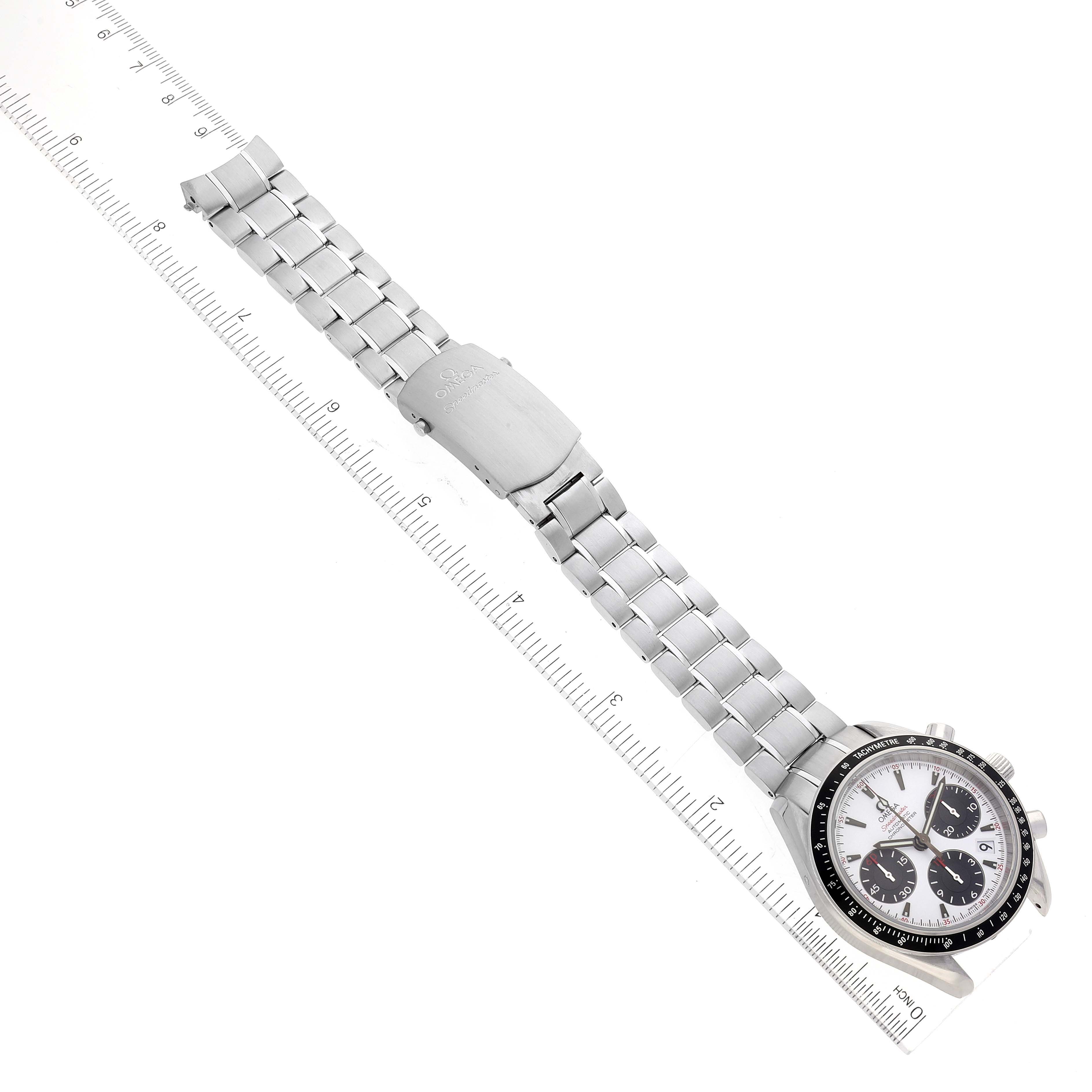 The image shows an Omega Speedmaster 323.30.40.40.04.001 Men's Stainless Steel White Dial 323.30.40.40.04.001 Men's Stainless Steel White Dial watch from a top-down perspective, highlighting its dial and stainless steel bracelet.