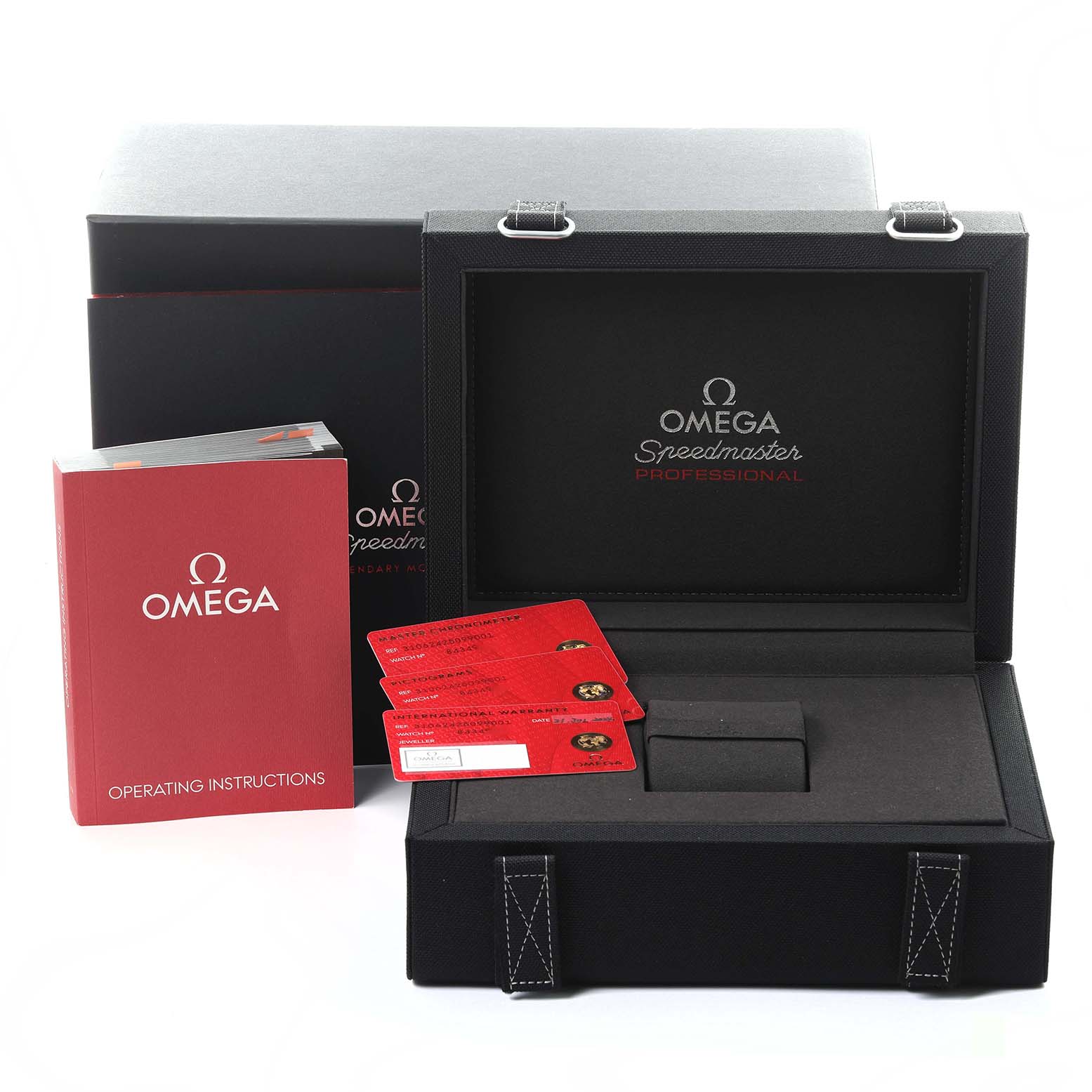 The image shows an Omega Speedmaster 310.62.42.50.99.001 Men's Yellow Gold Champagne Dial 310.62.42.50.99.001 Men's Yellow Gold Champagne Dial model's open box, instruction manual, and cards from a frontal angle.