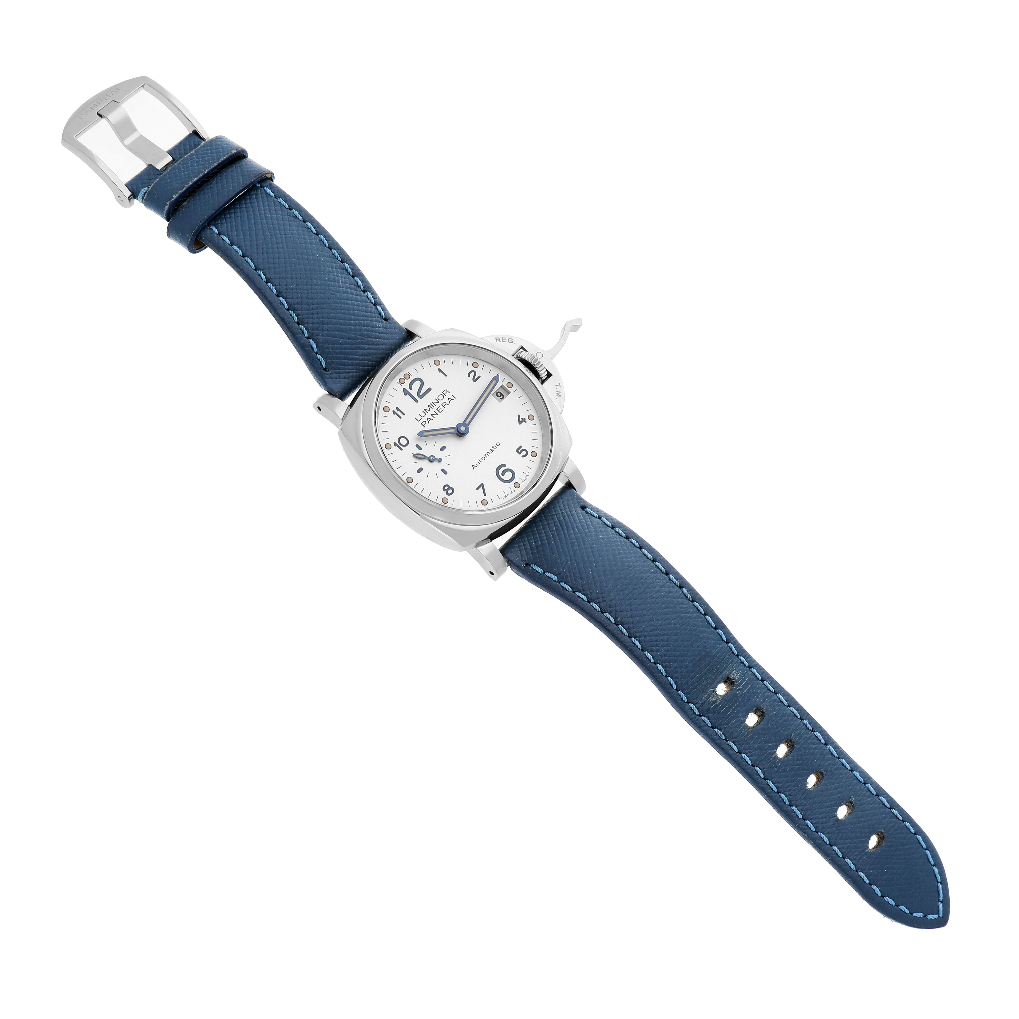 The Luminor Due by Panerai is shown at a slight angle, displaying the watch face, crown guard, and blue leather strap.