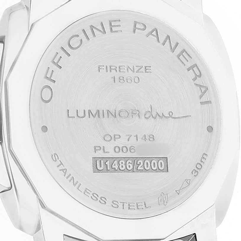 The image shows the engraved case back of a Panerai Luminor Due PAM00903 Men's Stainless Steel White Dial watch, featuring branding and model details.