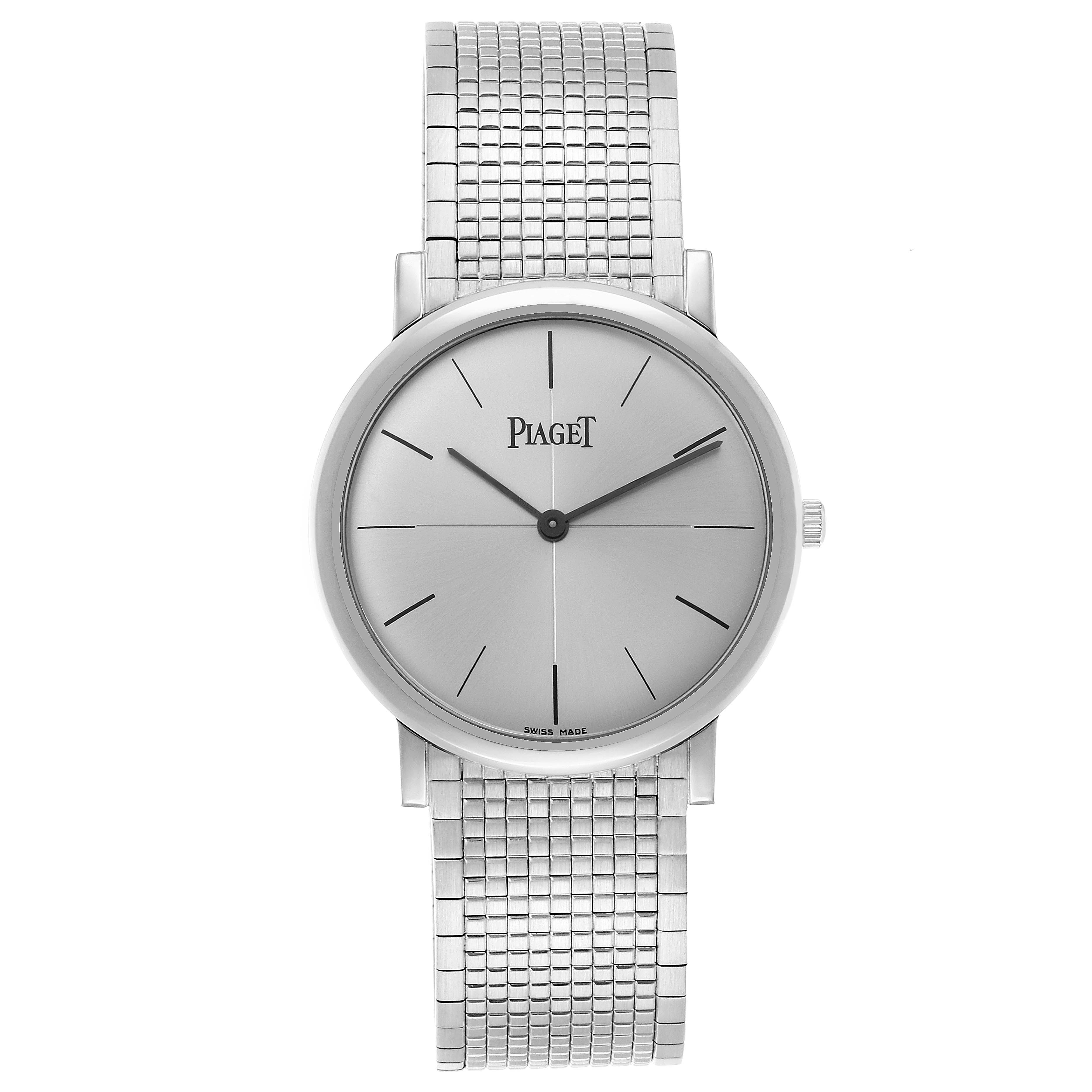 The Piaget P10178 Men
s White Gold Silver Dial Altiplano P10178 watch is shown from a top-down angle, displaying its silver dial, hands, and white gold mesh bracelet.