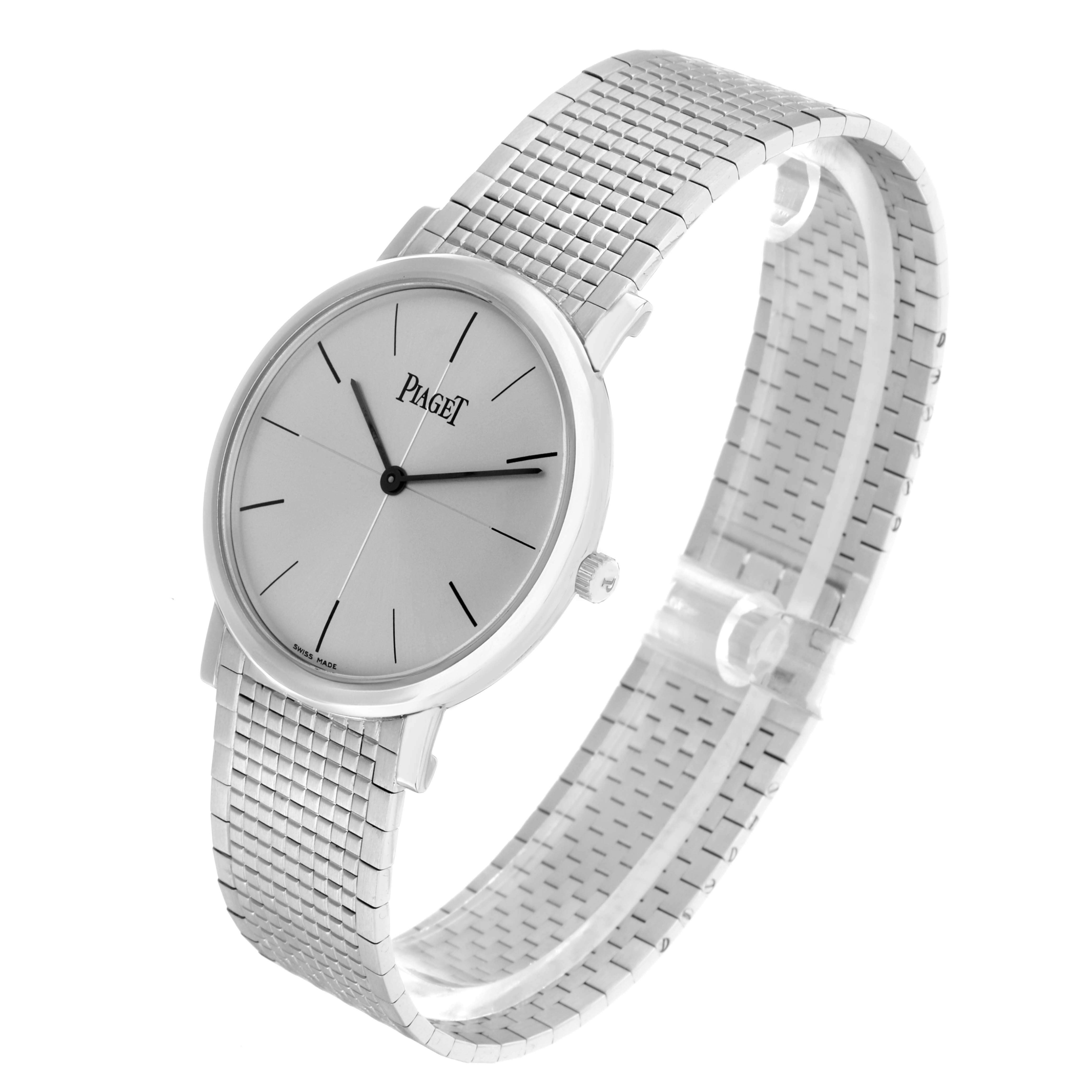 The Piaget P10178 Men
s White Gold Silver Dial Altiplano P10178 watch is shown at a three-quarter angle, displaying the silver dial, case, crown, and mesh bracelet.