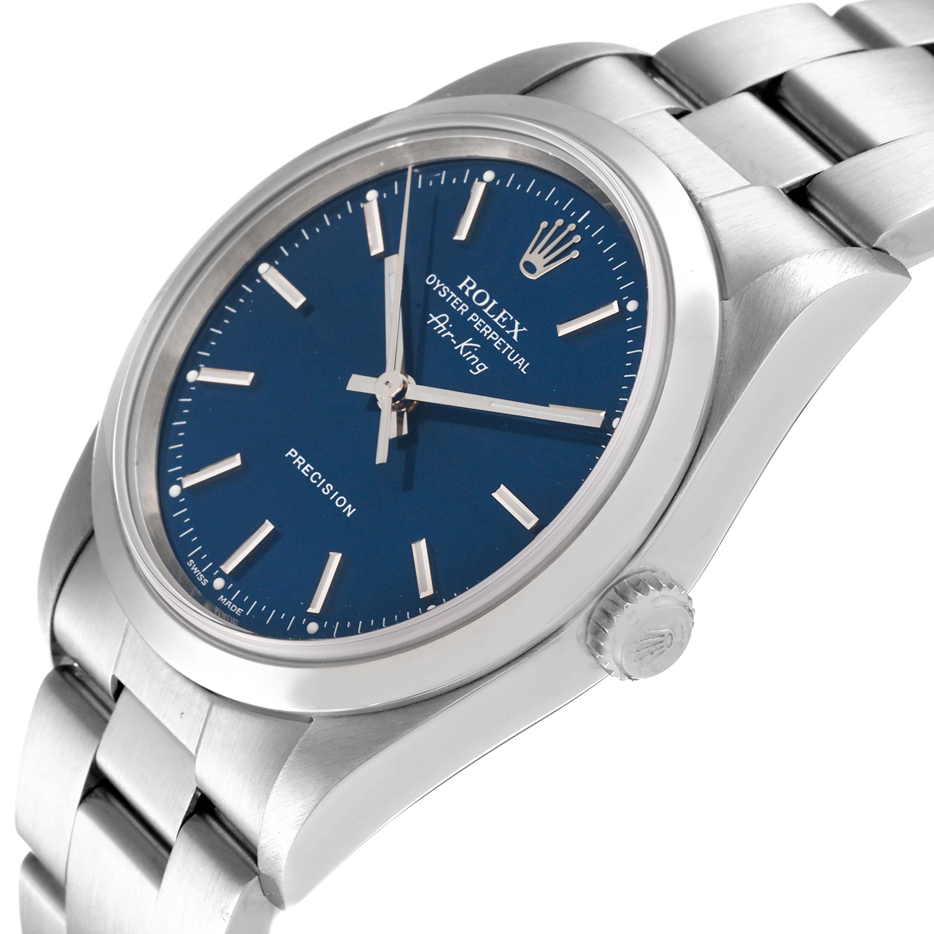 The Rolex Air-King 14000 Men's Stainless Steel Blue Dial 14000 Men's Stainless Steel Blue Dial watch is shown at an angled view, displaying its face, bezel, crown, and part of the bracelet.