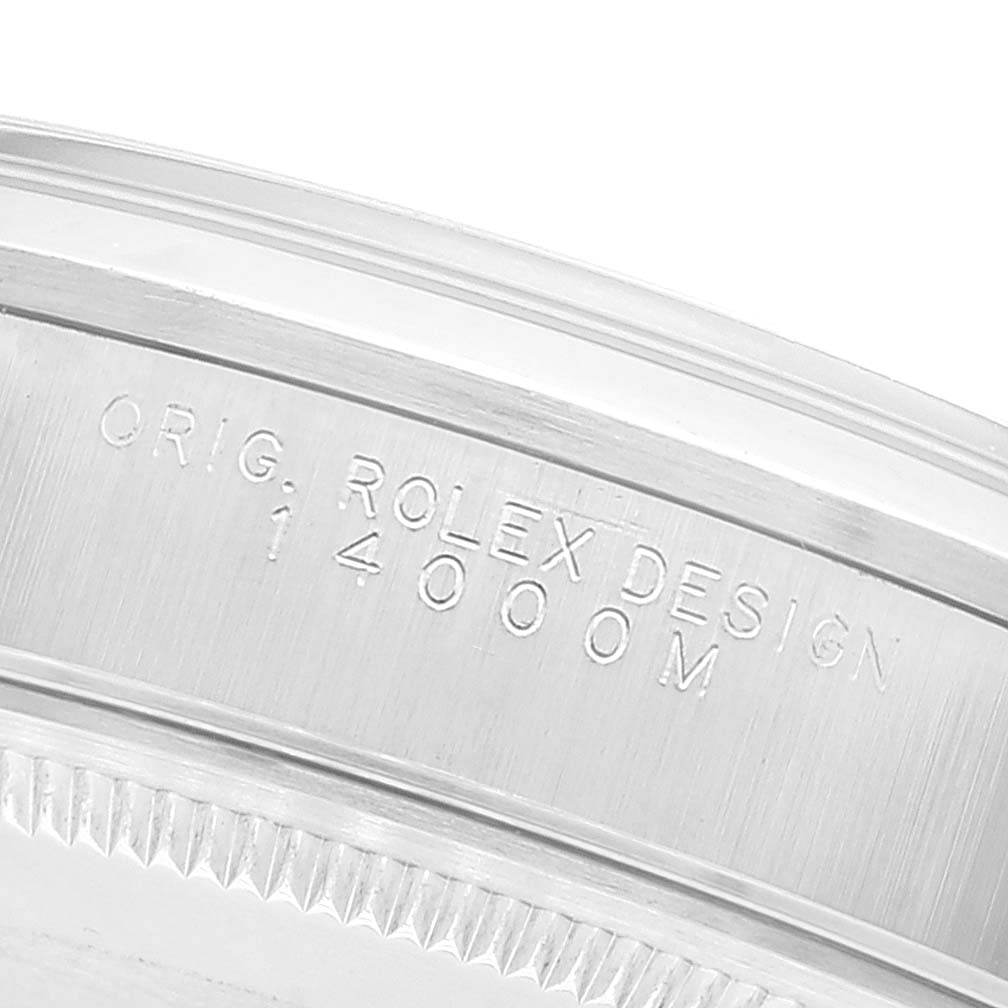 This image shows a close-up of the side casing, with engraved text for the Air-King model by Rolex.