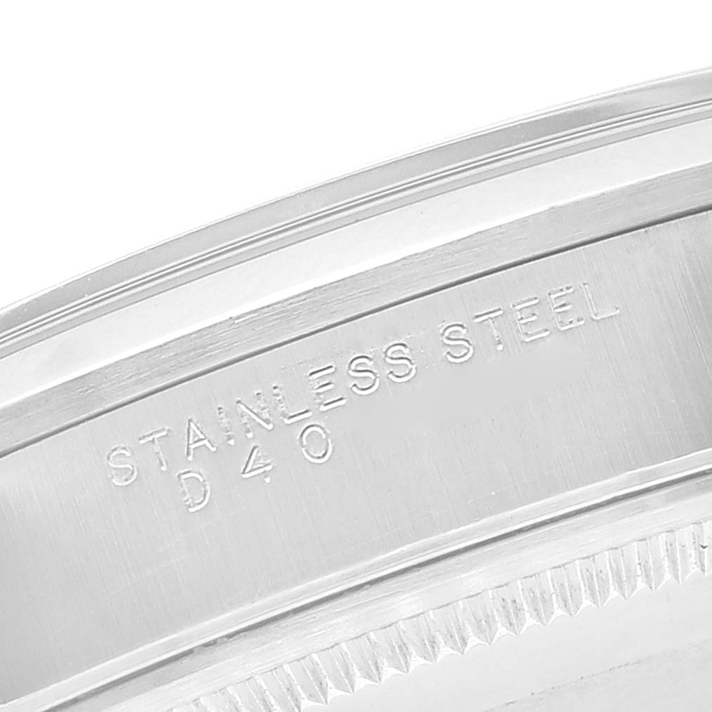This image shows a close-up angle of the case back of a Rolex Air-King 14000M Men's Stainless Steel Black Dial 14000M Men's Stainless Steel Black Dial watch, displaying the "STAINLESS STEEL" engraving.