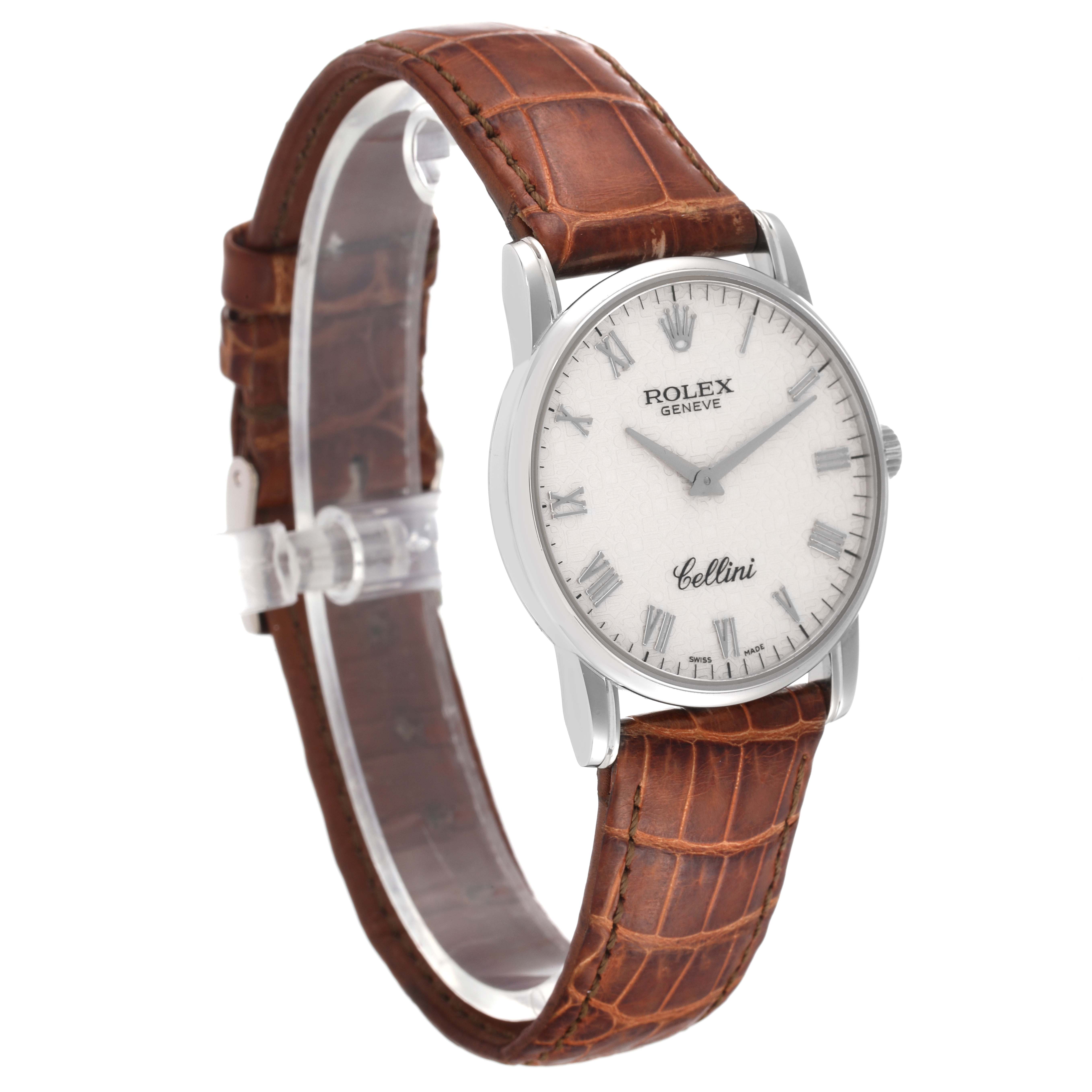 The Rolex Cellini 5116 Men's White Gold Beige Dial 5116 Men's White Gold Beige Dial watch is shown at a slight angle, displaying its dial, case, and brown leather strap.