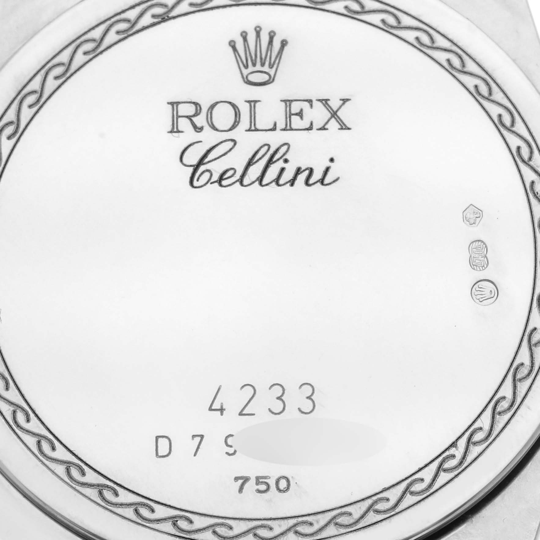 The image shows a close-up of the back of a Rolex Cellini 4233/9 Men's Steel and Gold (two tone) White Dial 4233/9 Men's Steel and Gold (two tone) White Dial watch with engravings and hallmarks.
