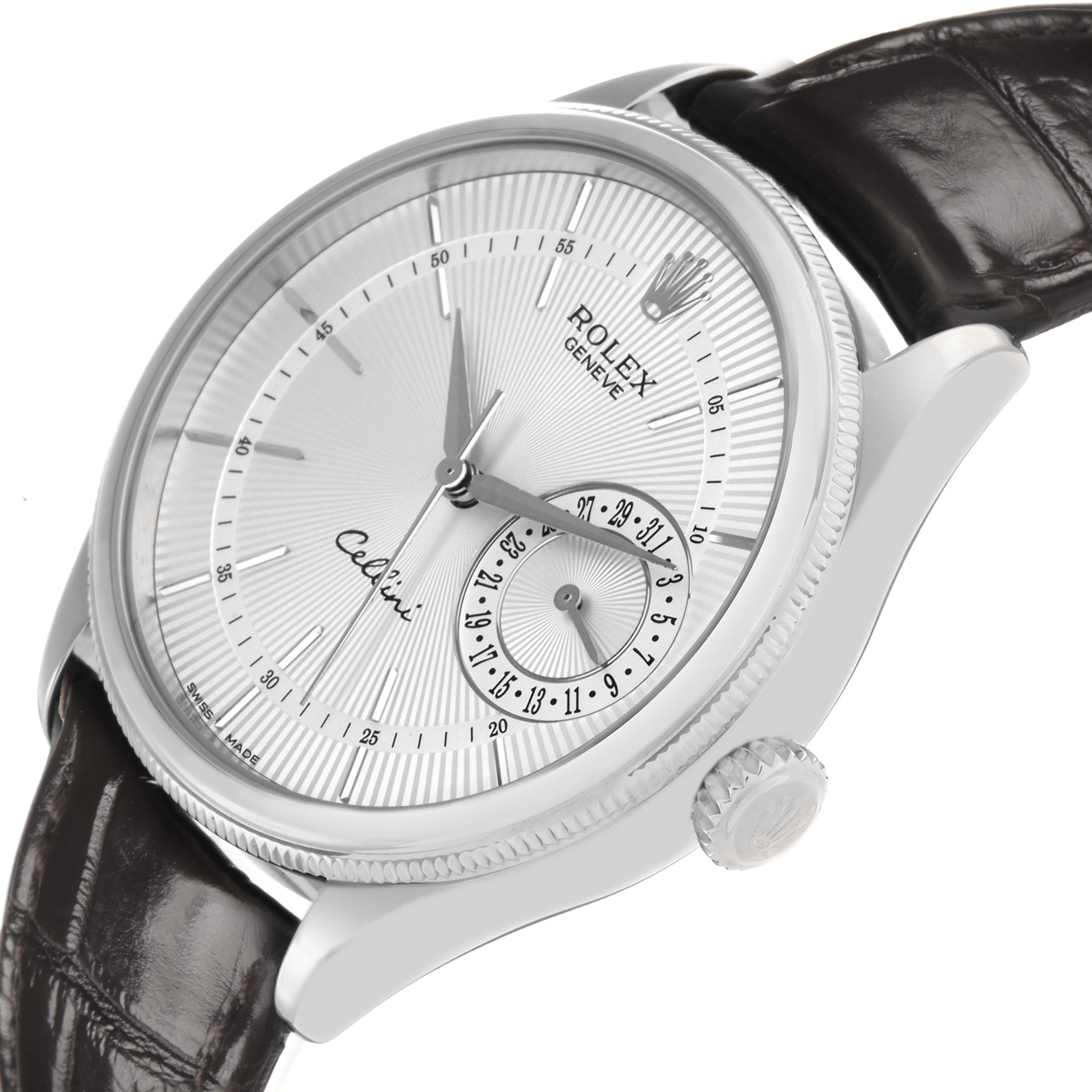 The Rolex Cellini 50519 Men
s White Gold Silver Dial watch is shown at an angled view, highlighting its dial, crown, and leather strap.