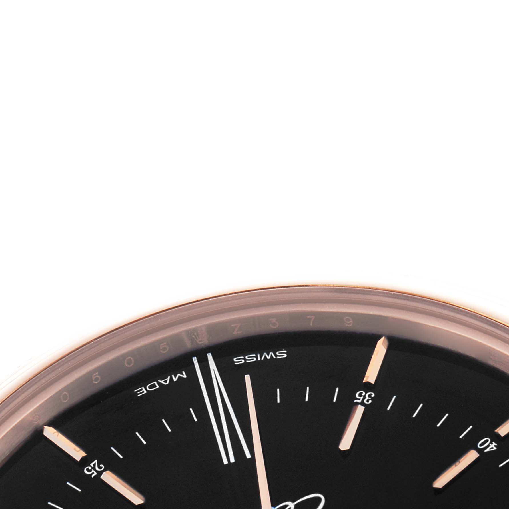 The image shows the top section of the dial of a Rolex Cellini 50505 Men
s Rose Gold Black Dial, focusing on hour markers and part of the bezel.