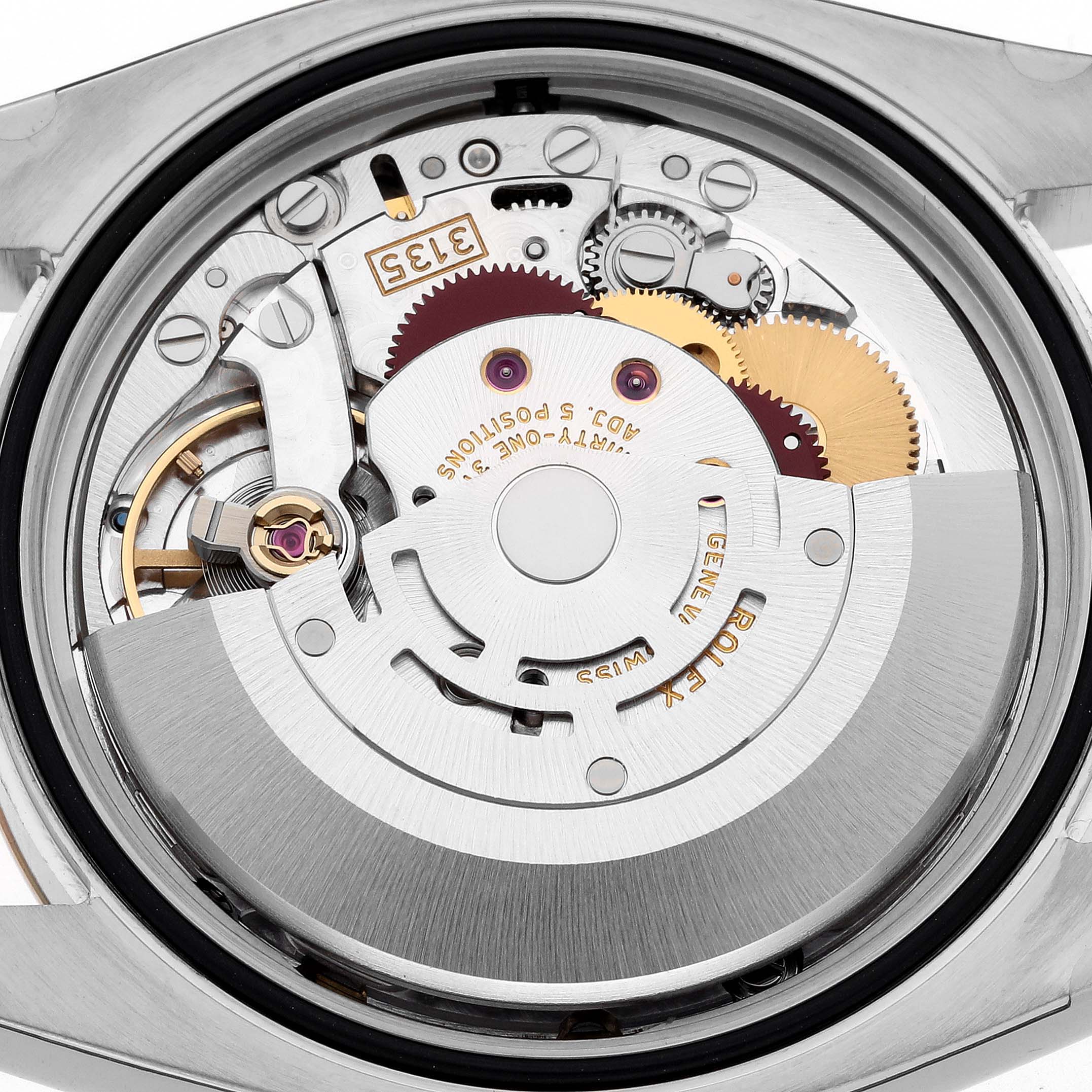 The image shows the movement mechanism of the Rolex Datejust 116201 Men's Steel and Gold (two tone) Pink Dial 116201 Men's Steel and Gold (two tone) Pink Dial watch from a rear angle, highlighting gears and rotors.