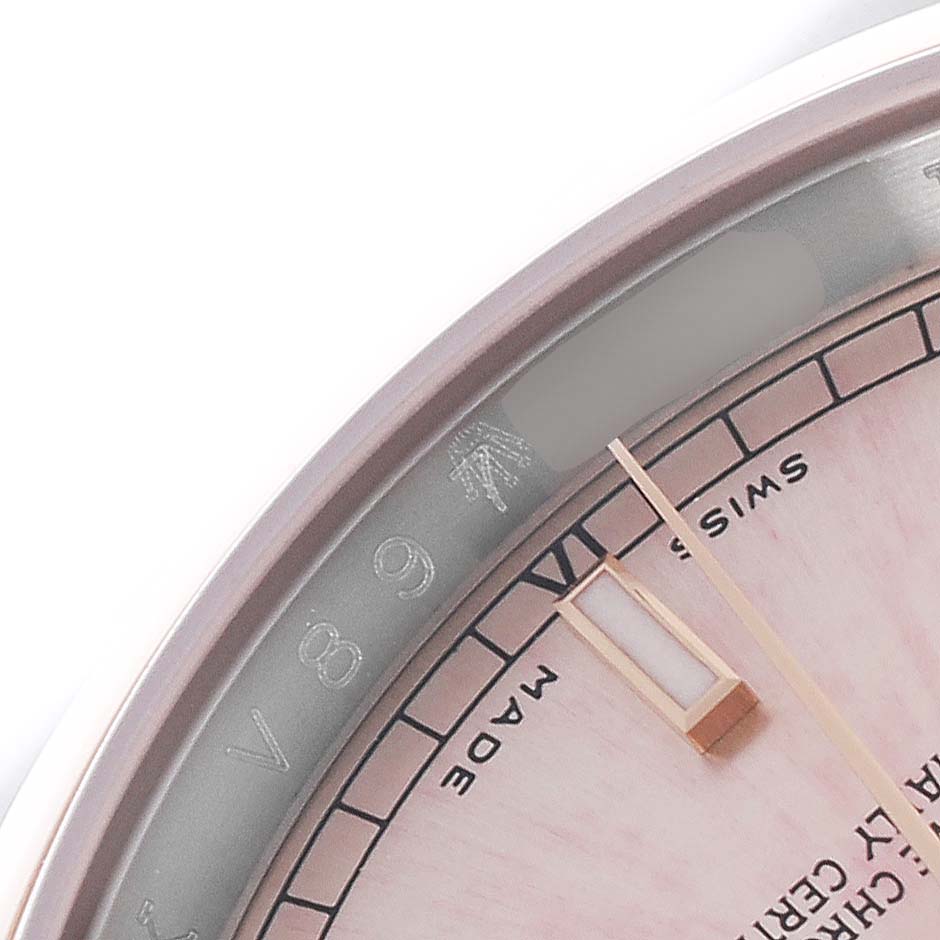 The image shows a close-up of the dial's edge and indices of a Rolex Datejust 116201 Men's Steel and Gold (two tone) Pink Dial 116201 Men's Steel and Gold (two tone) Pink Dial watch.